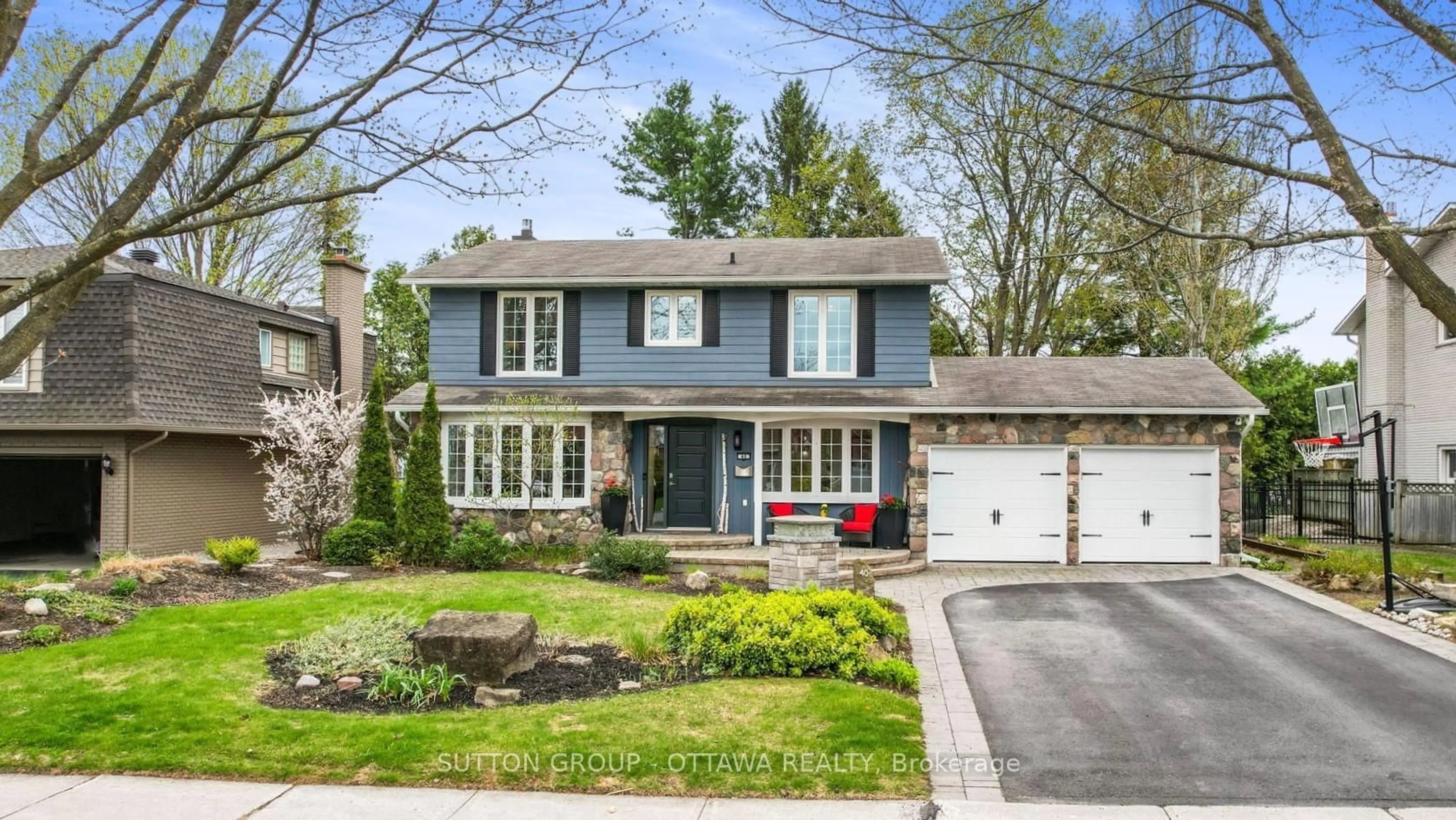 Home with brick exterior material, street for 40 St Remy Dr, Ottawa Ontario K2J 1A3