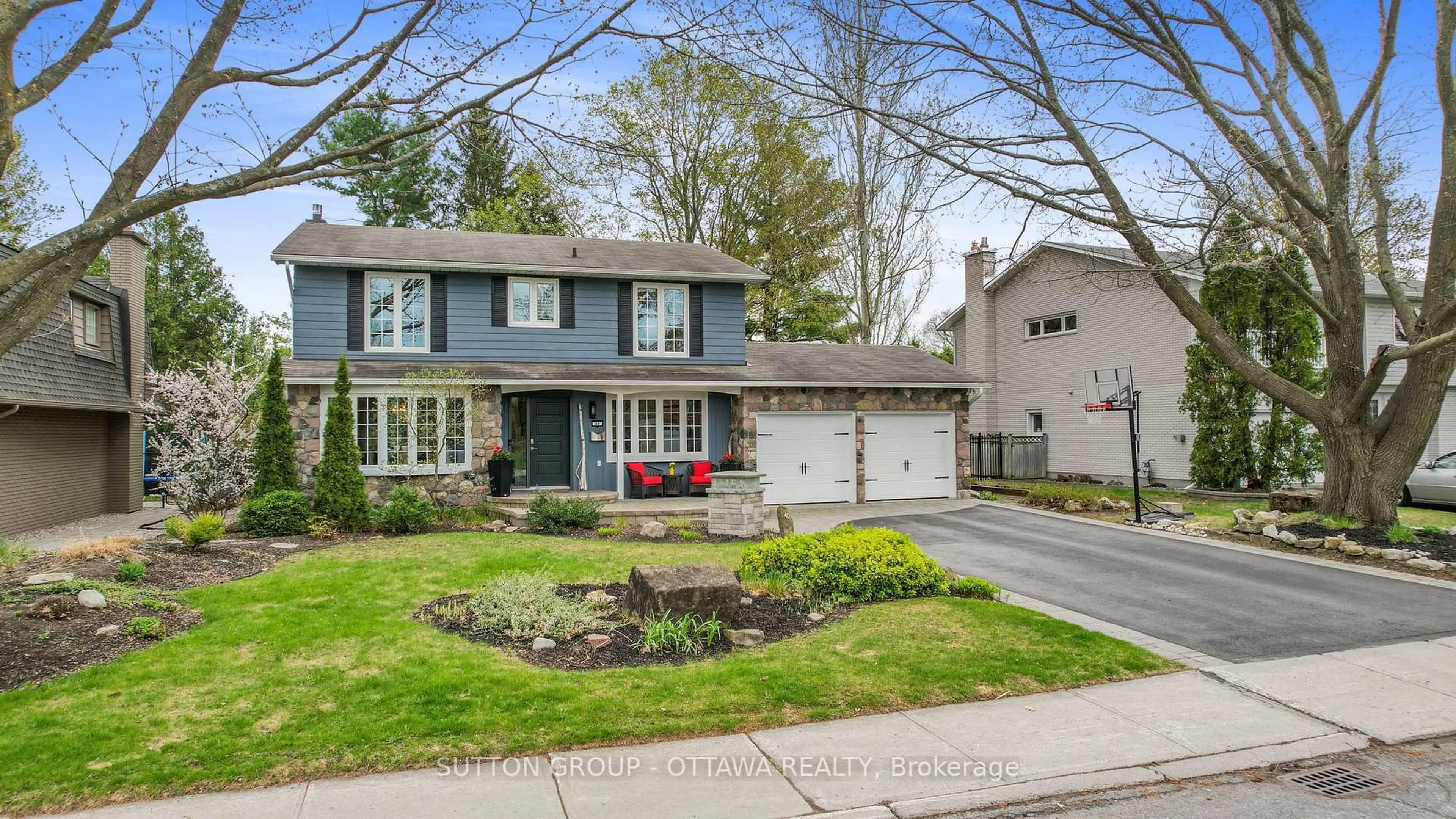 Home with vinyl exterior material, street for 40 St Remy Dr, Ottawa Ontario K2J 1A3