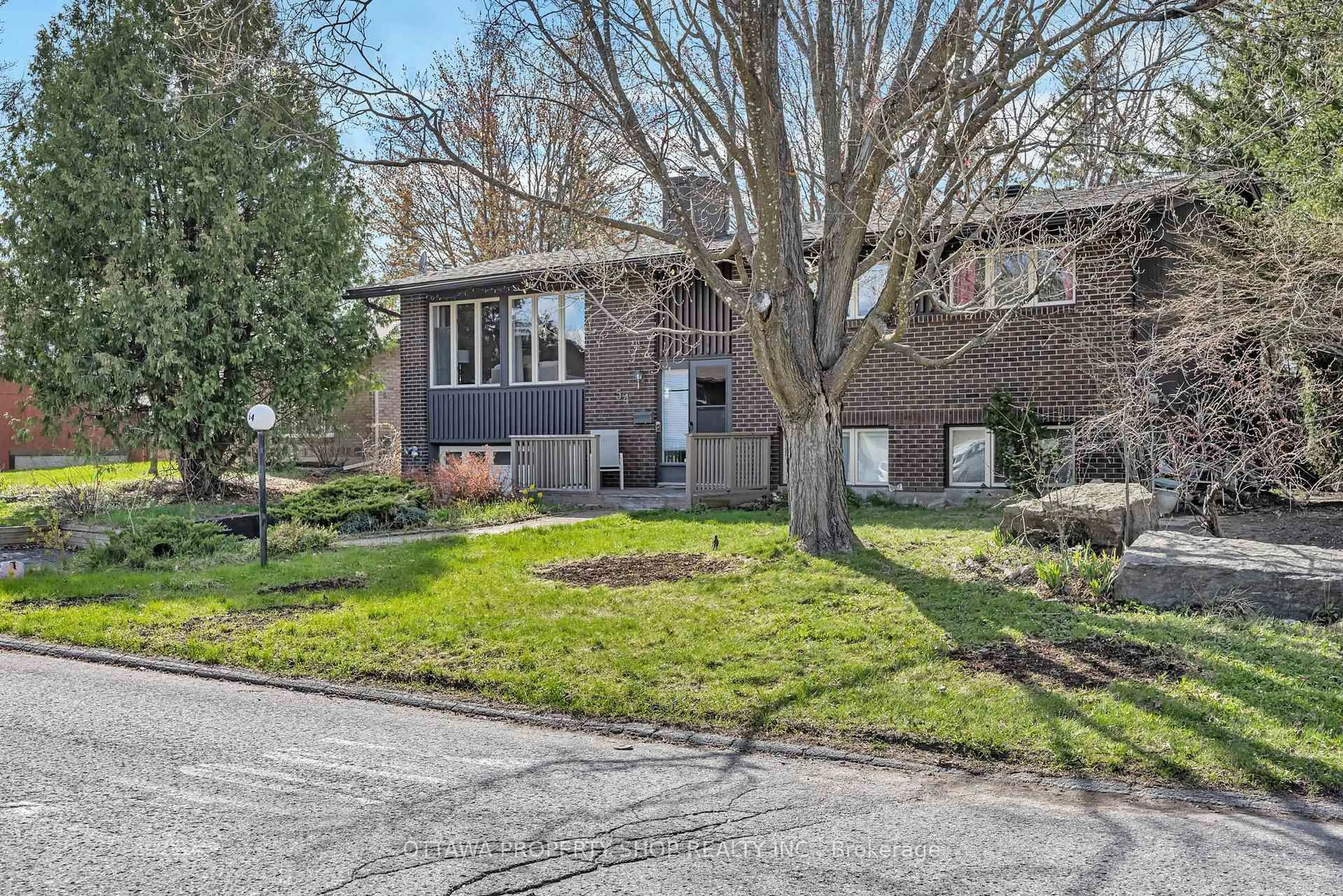 Home with brick exterior material, street for 54 Chimo Dr, Kanata Ontario K2L 1Y9