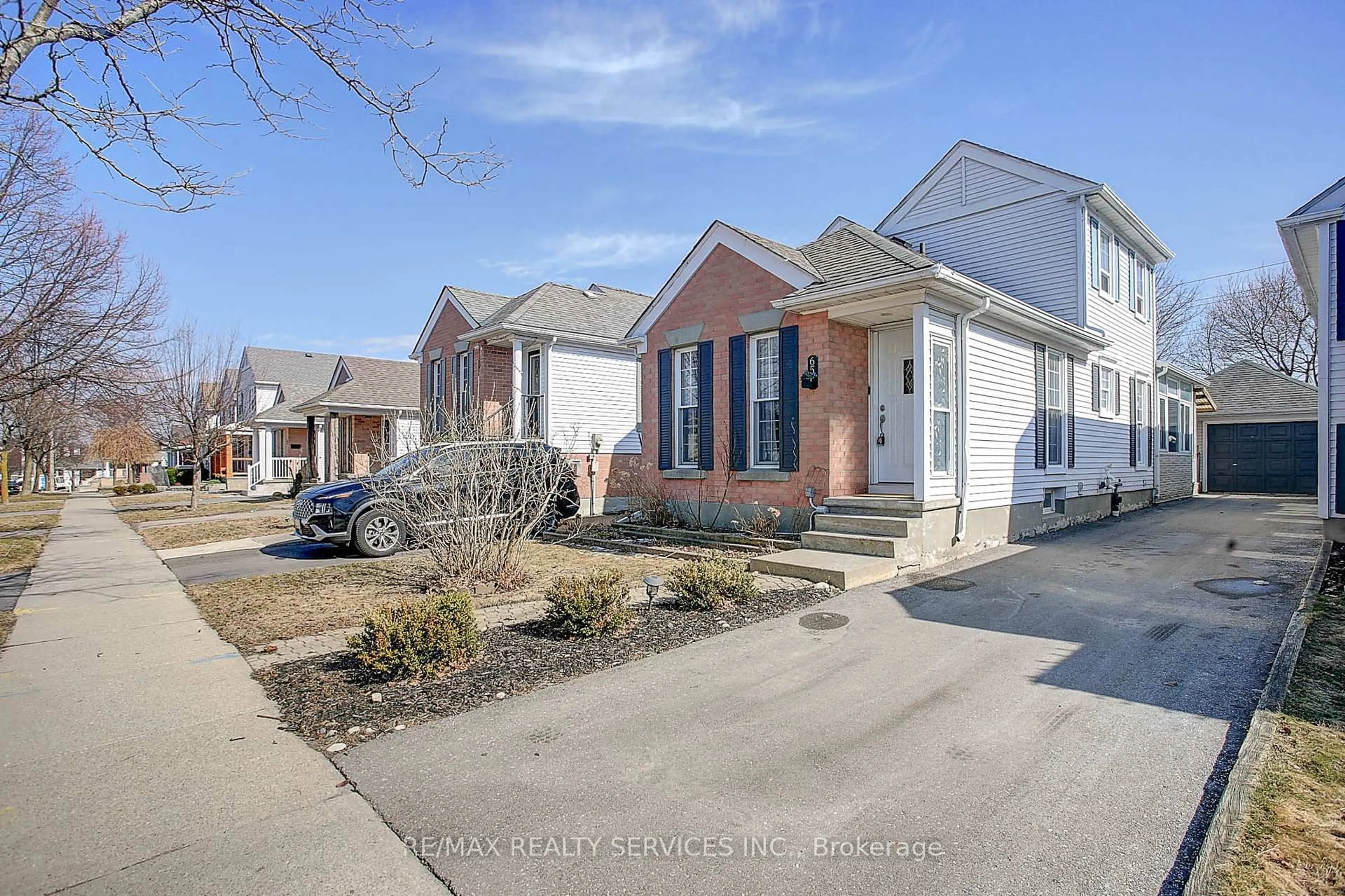Home with brick exterior material, street for 65 Wake Robin Dr, Kitchener Ontario N2E 3L4