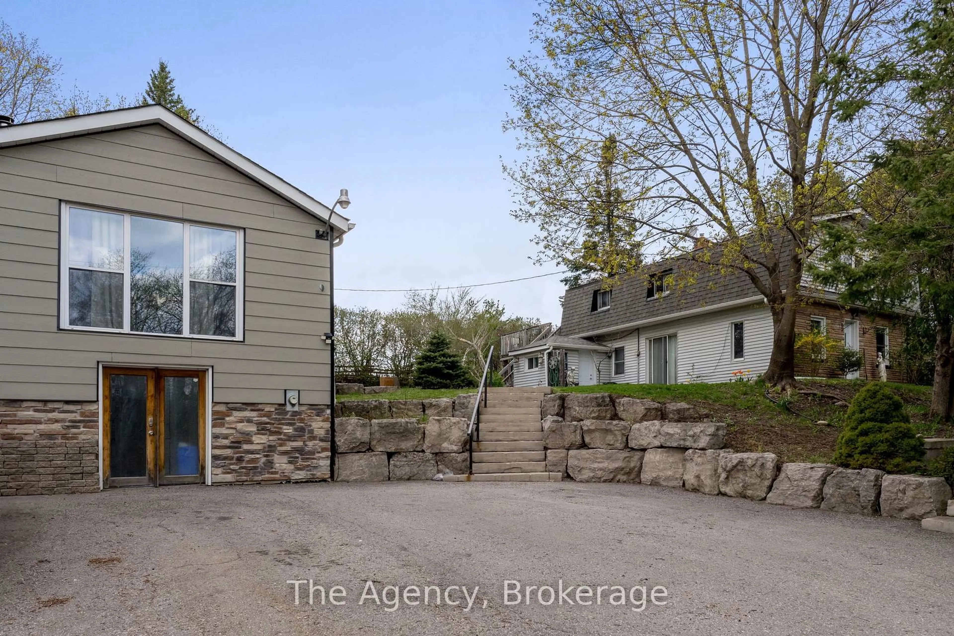 A pic from outside/outdoor area/front of a property/back of a property/a pic from drone, street for 45 Wellington Road 124 N/A, Erin Ontario N0B 1T0