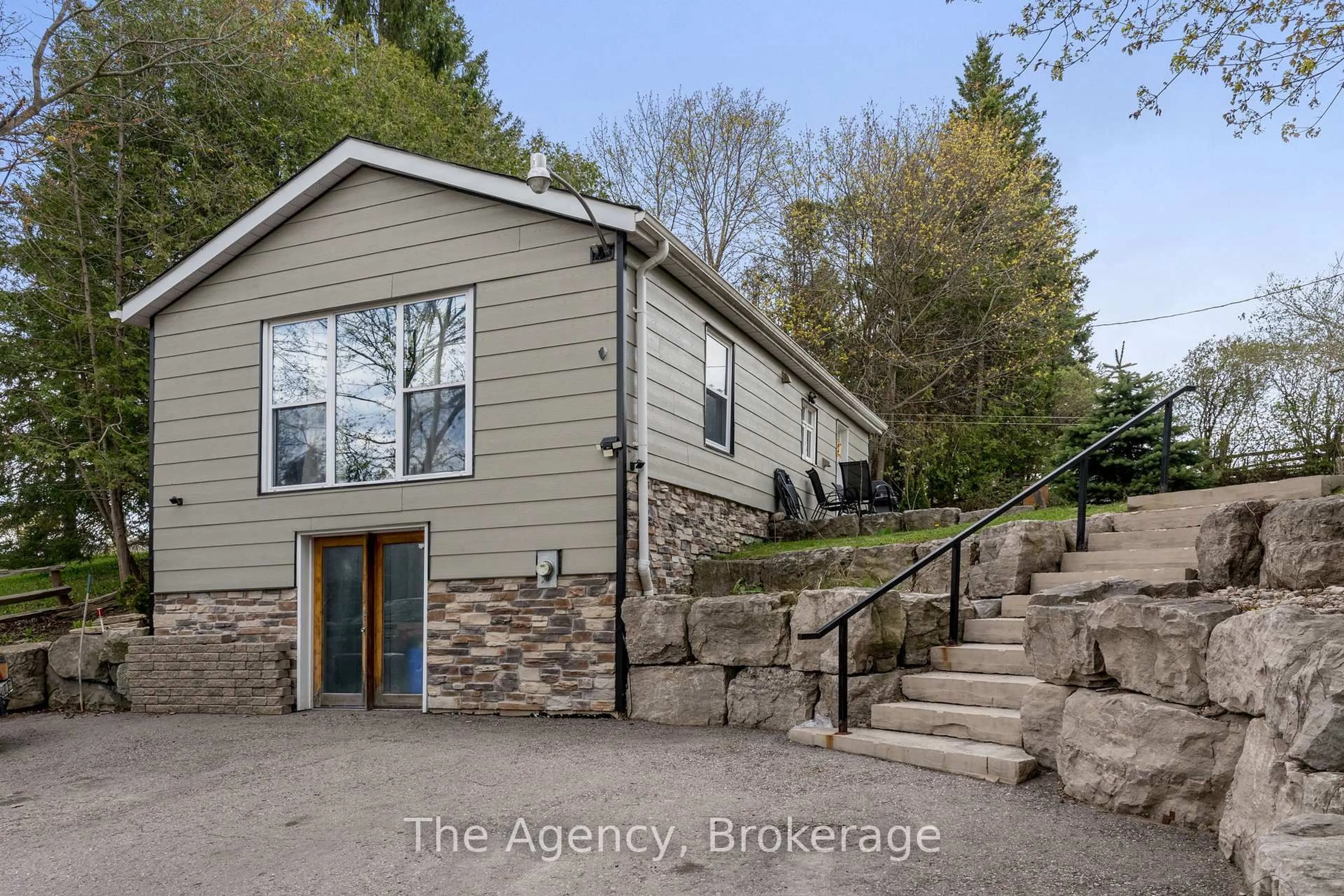 A pic from outside/outdoor area/front of a property/back of a property/a pic from drone, street for 45 Wellington Road 124 N/A, Erin Ontario N0B 1T0