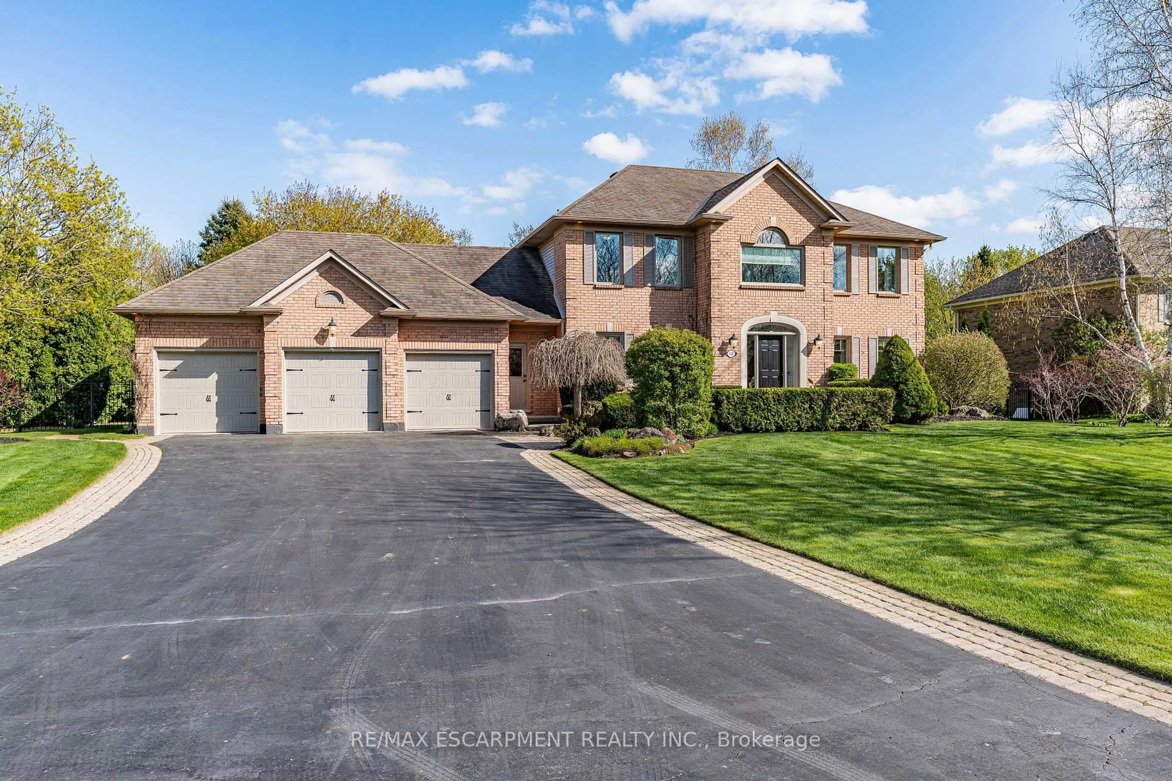 Home with brick exterior material, street for 12 Elderberry Lane, Hamilton Ontario L0R 1H2