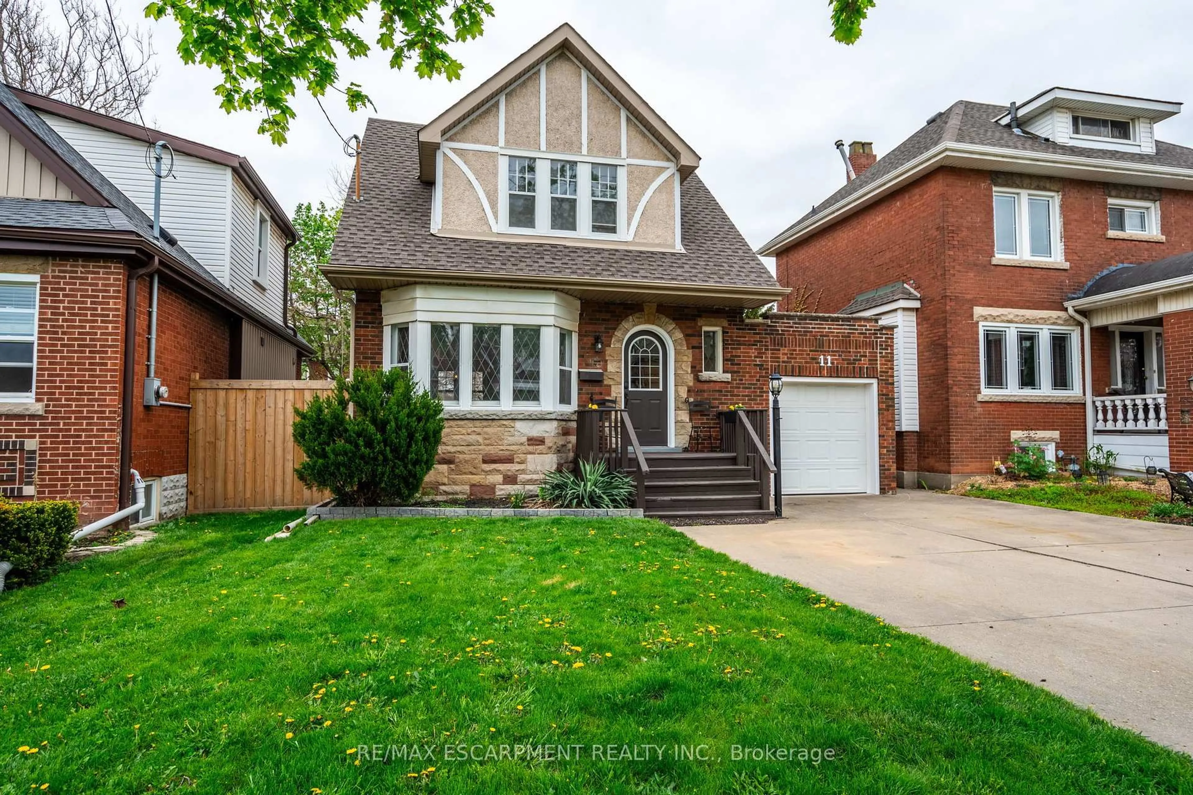Home with brick exterior material, street for 11 Huxley Ave, Hamilton Ontario L8K 2P5