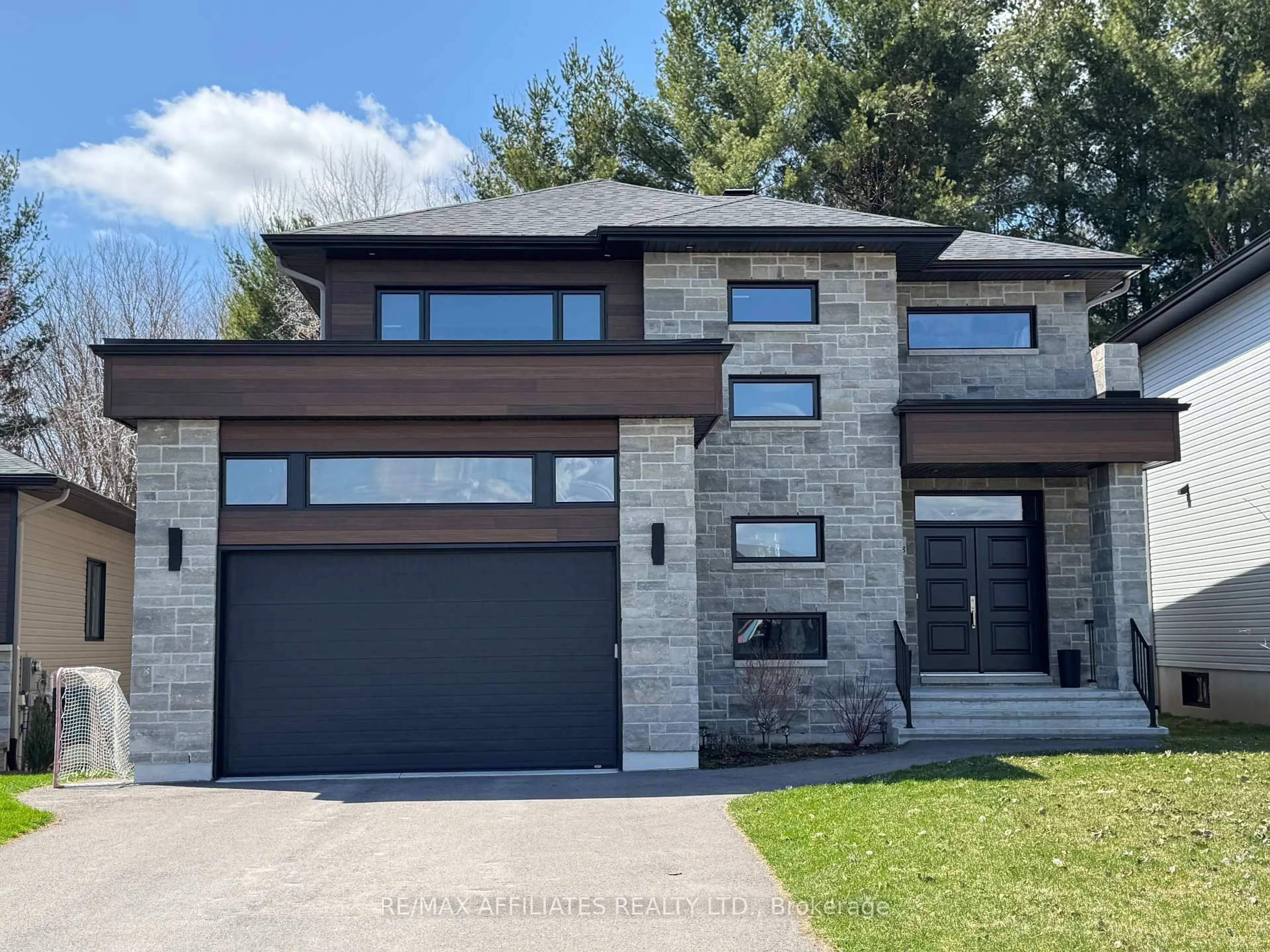 Home with brick exterior material, street for 248 Nature St, Casselman Ontario K0A 1M0