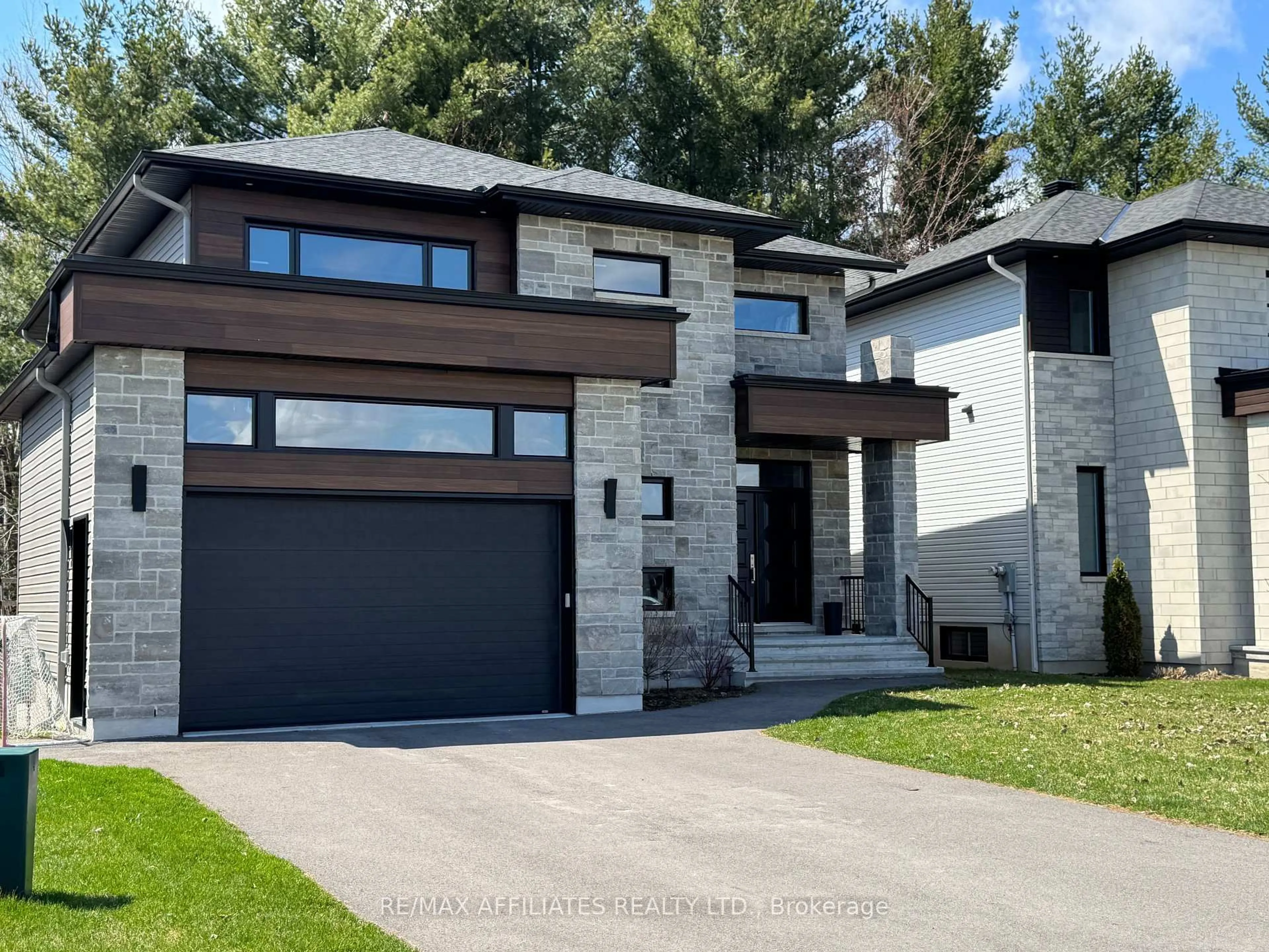 Home with brick exterior material, street for 248 Nature St, Casselman Ontario K0A 1M0