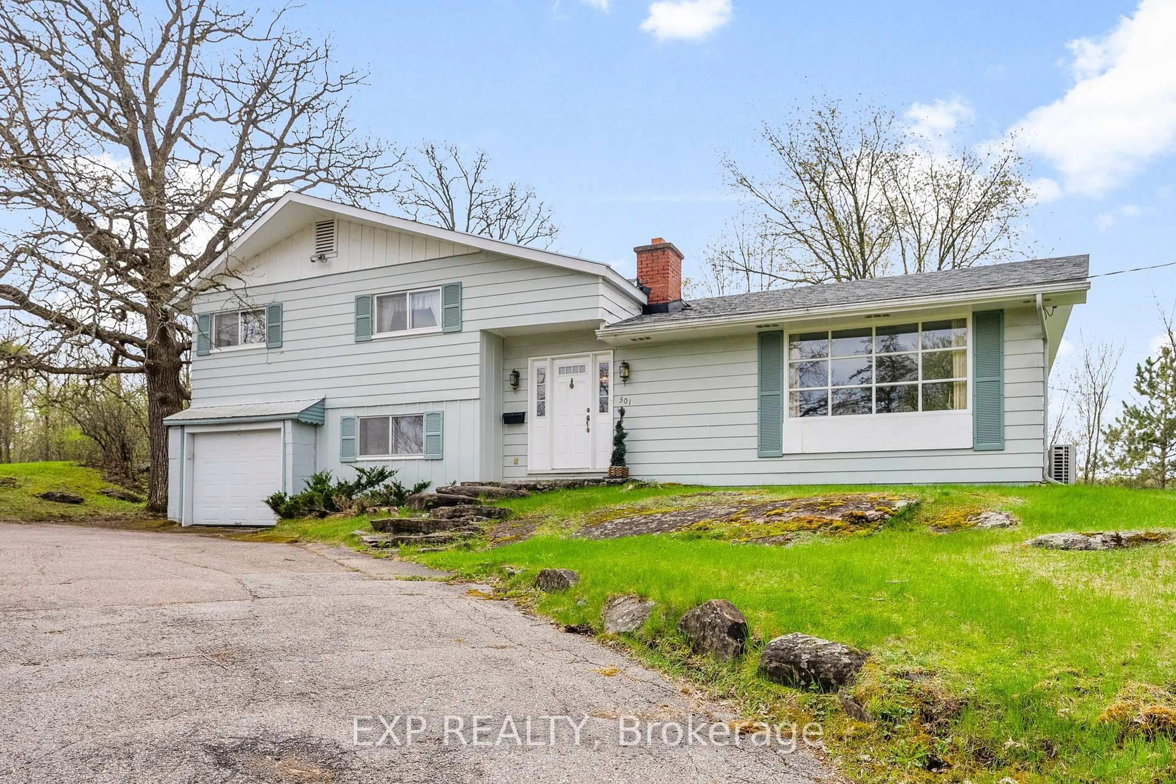Home with vinyl exterior material, street for 301 Opeongo Rd, Renfrew Ontario K7V 2T6