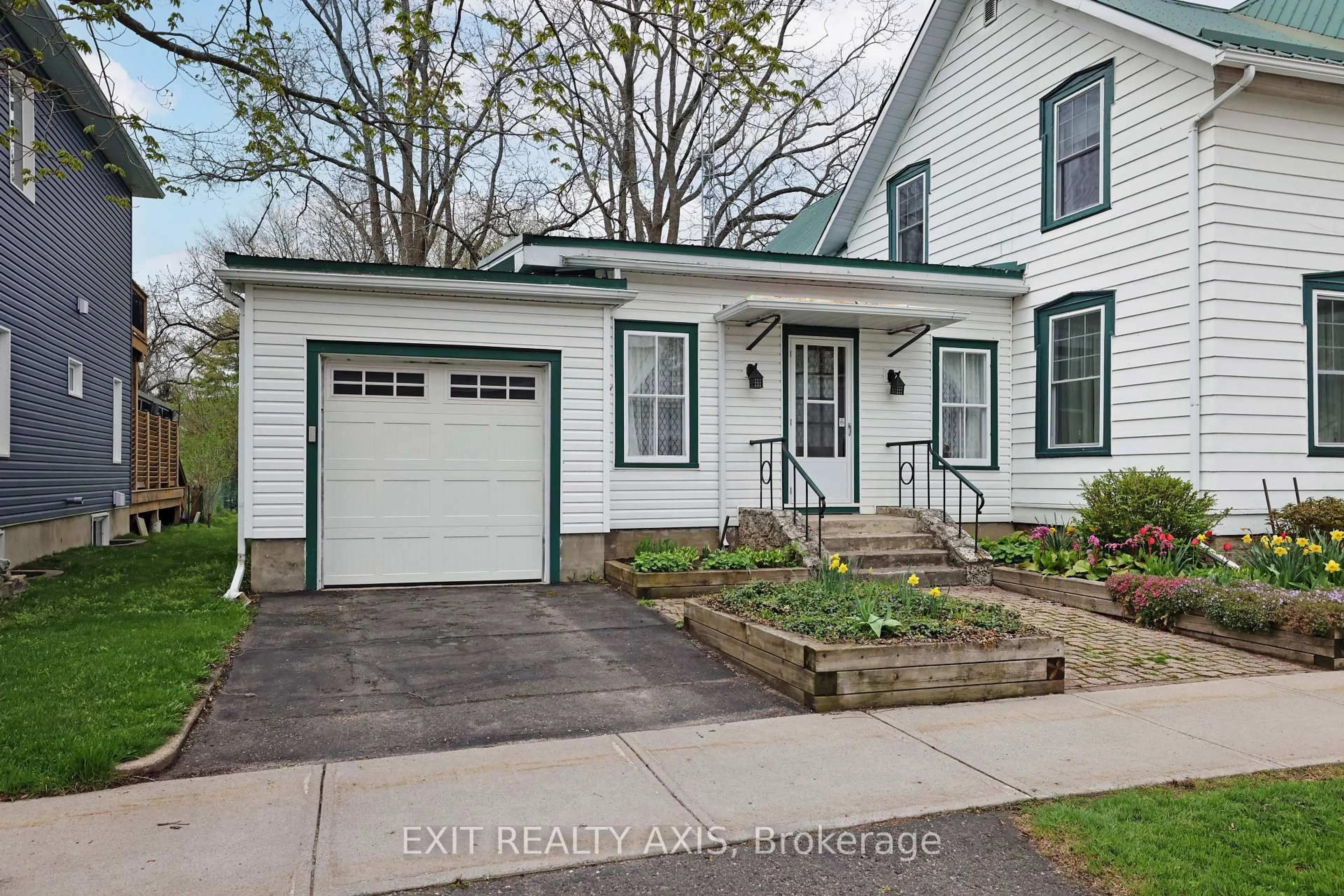 Home with vinyl exterior material, street for 34 Church St, Westport Ontario K0G 1X0