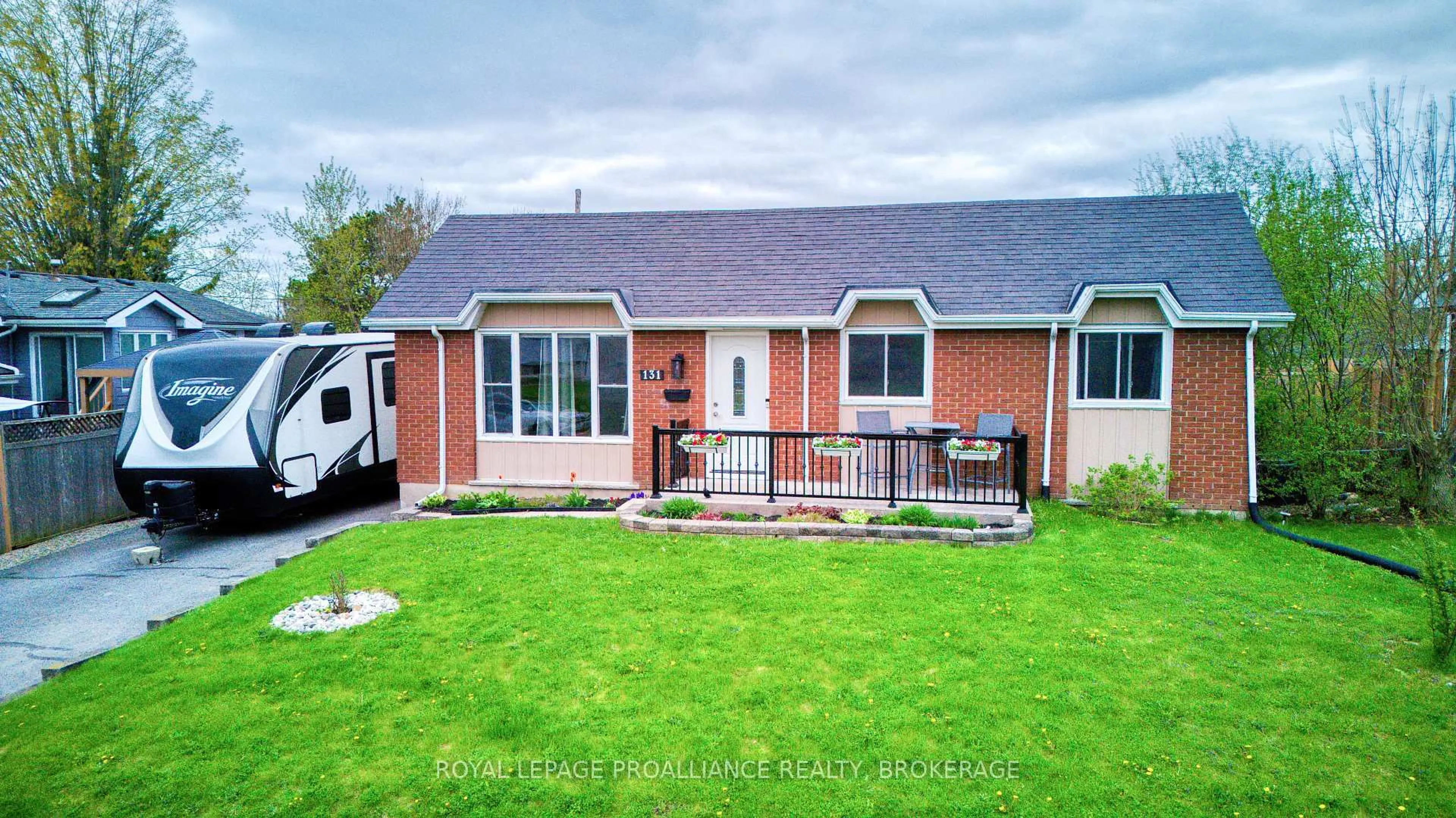 A pic from outside/outdoor area/front of a property/back of a property/a pic from drone, street for 131 Chesterfield Dr, Loyalist Ontario K7N 1M5