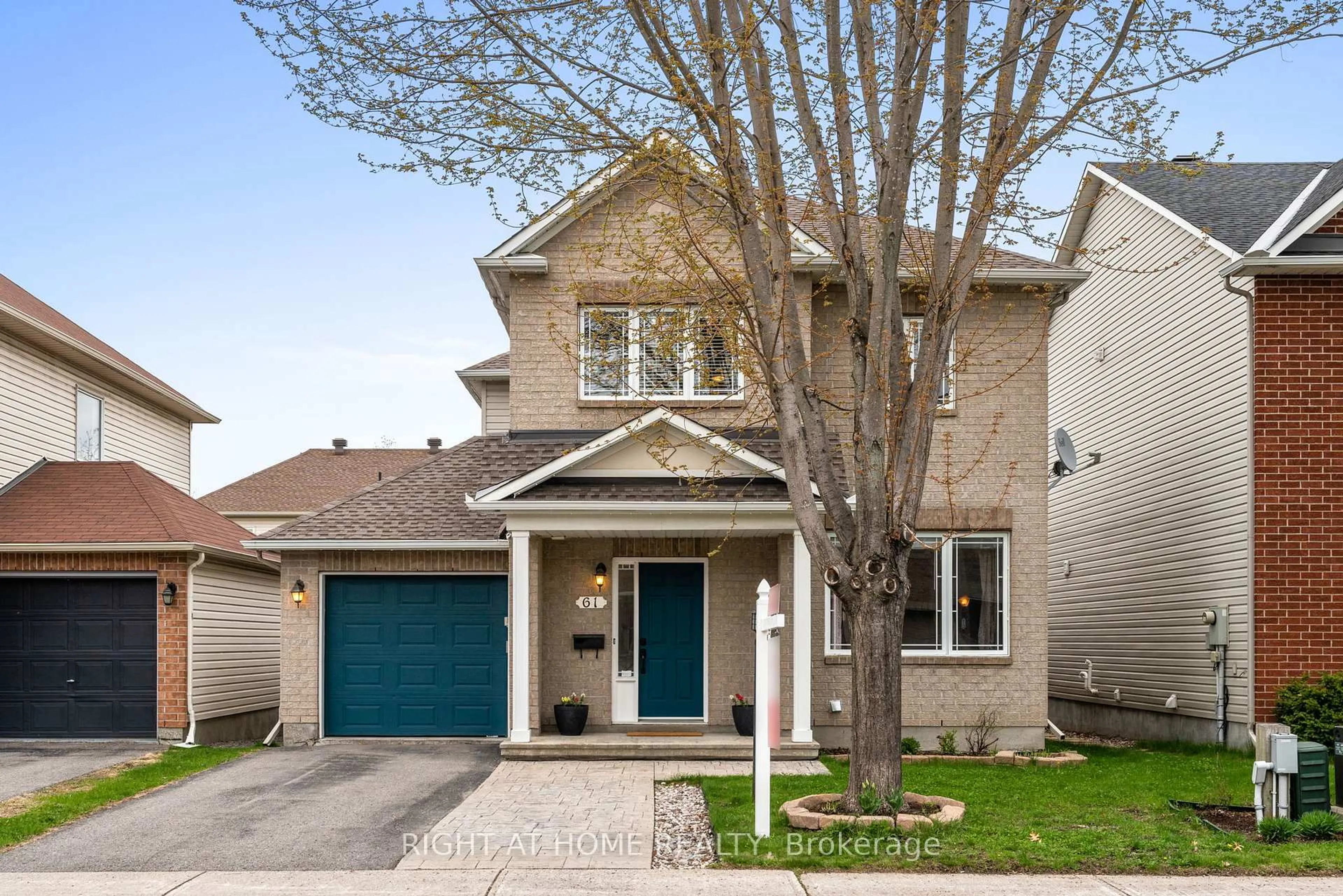 Home with vinyl exterior material, street for 61 Sunvale Way, Ottawa Ontario K2G 6X7