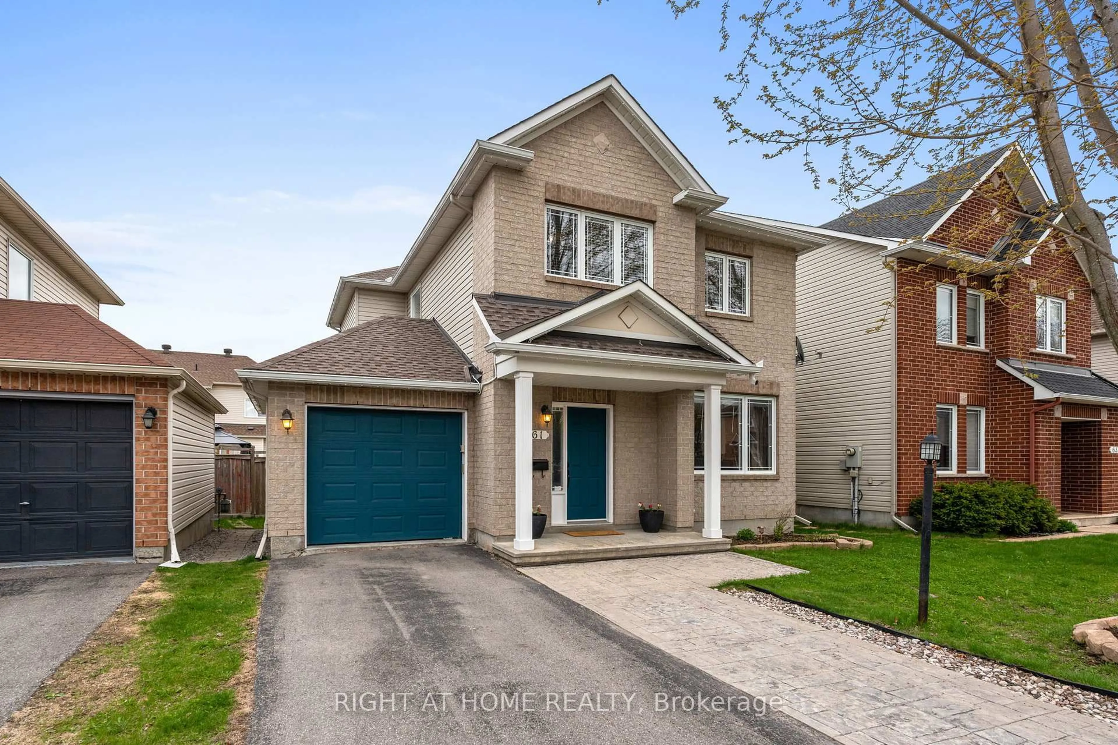 Home with brick exterior material, street for 61 Sunvale Way, Ottawa Ontario K2G 6X7