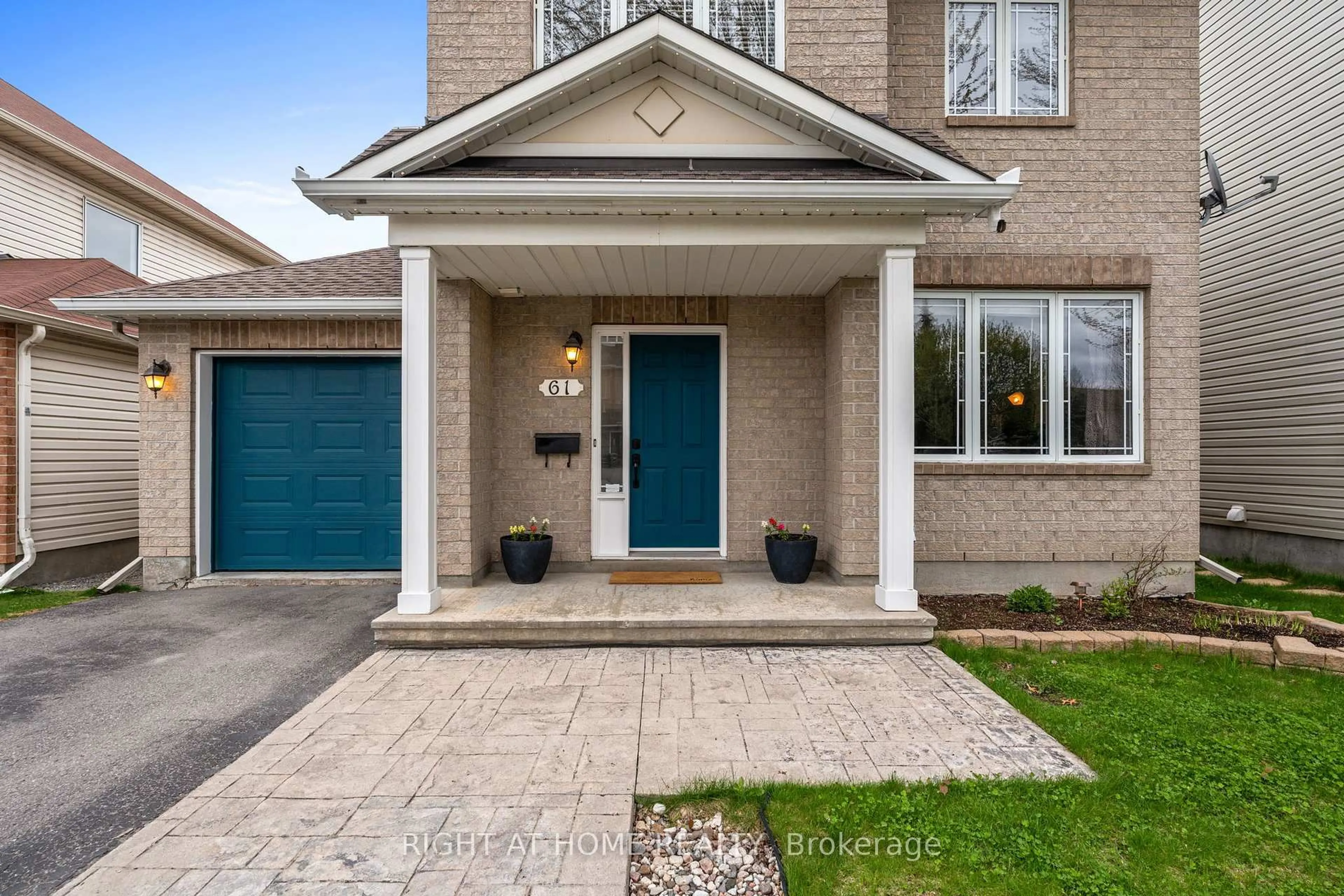 Home with brick exterior material, street for 61 Sunvale Way, Ottawa Ontario K2G 6X7