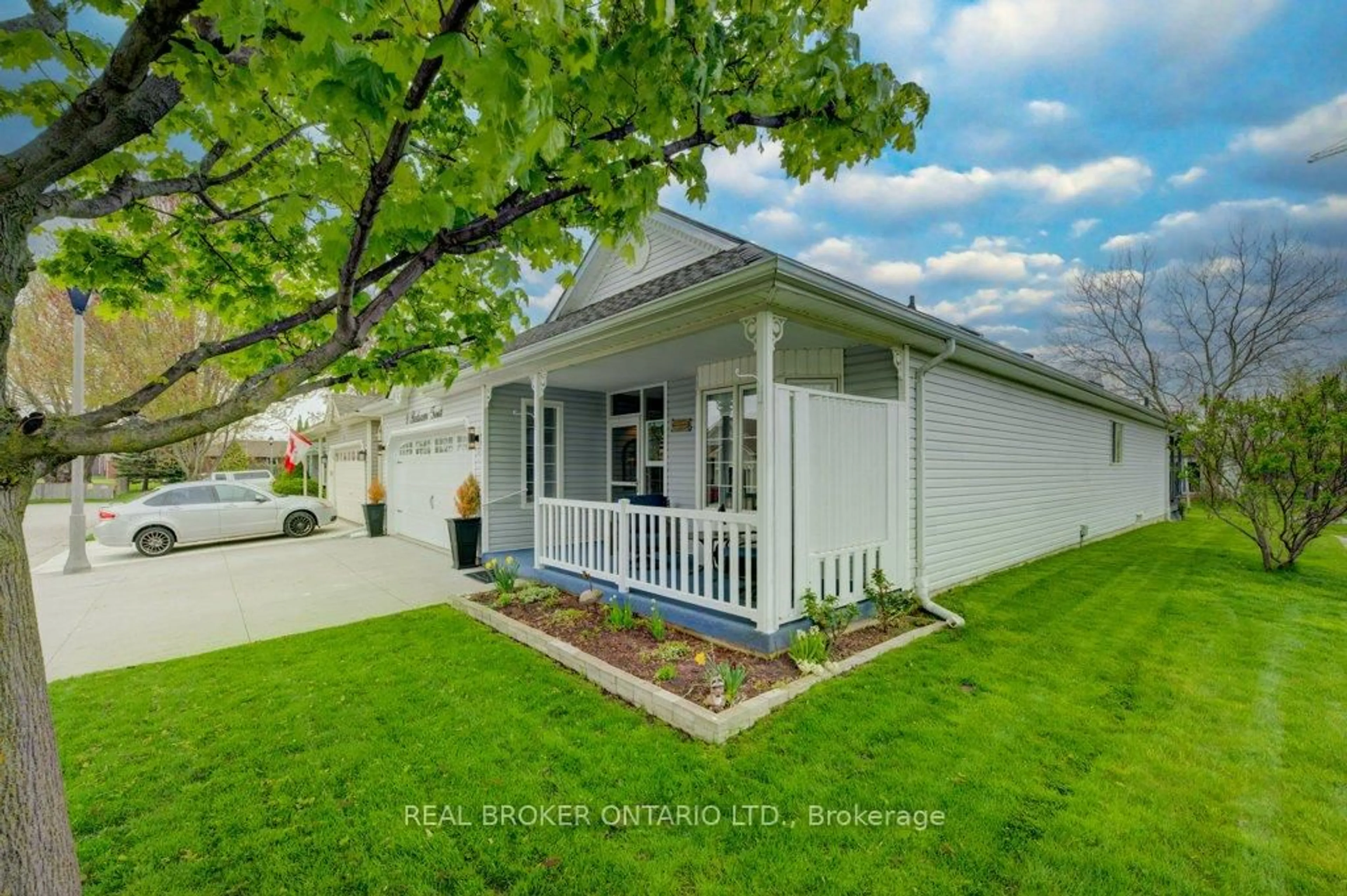 Home with vinyl exterior material, street for 9 Balsam Tr, Norfolk Ontario N0E 1M0
