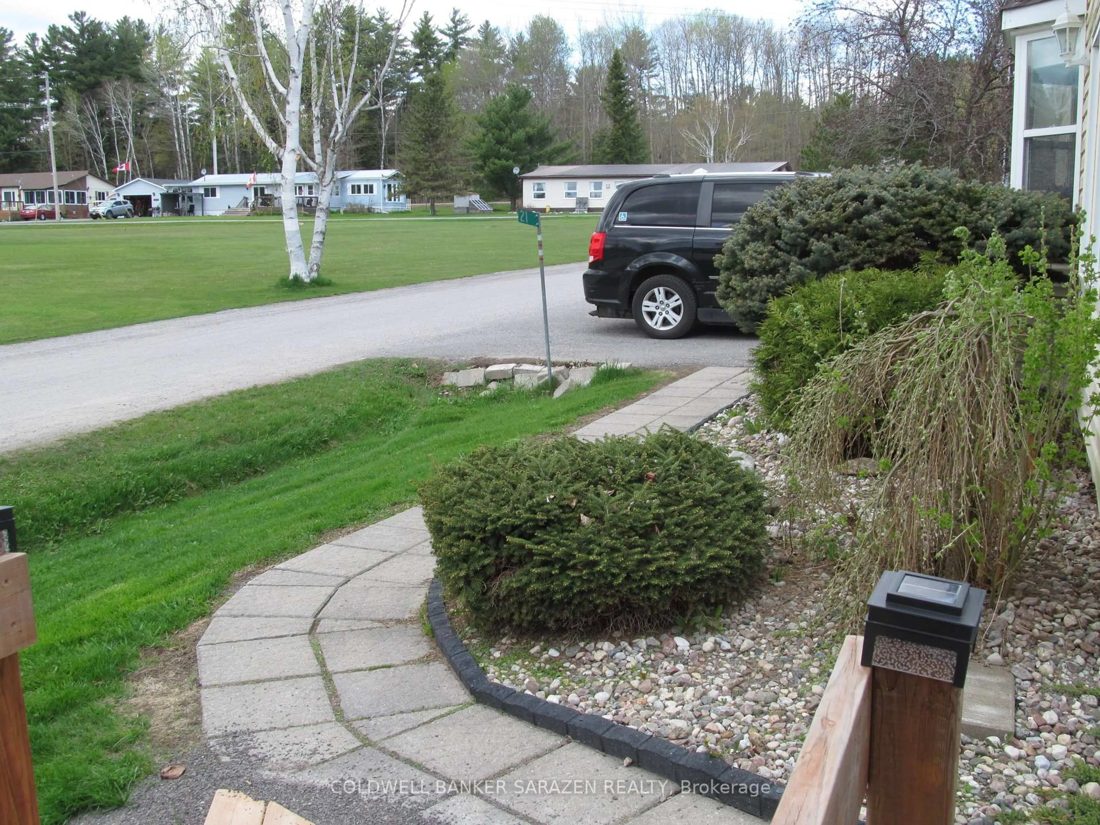 A pic from outside/outdoor area/front of a property/back of a property/a pic from drone, unknown for 21 Lakefront Lane, White Lake Ontario K0A 3L0