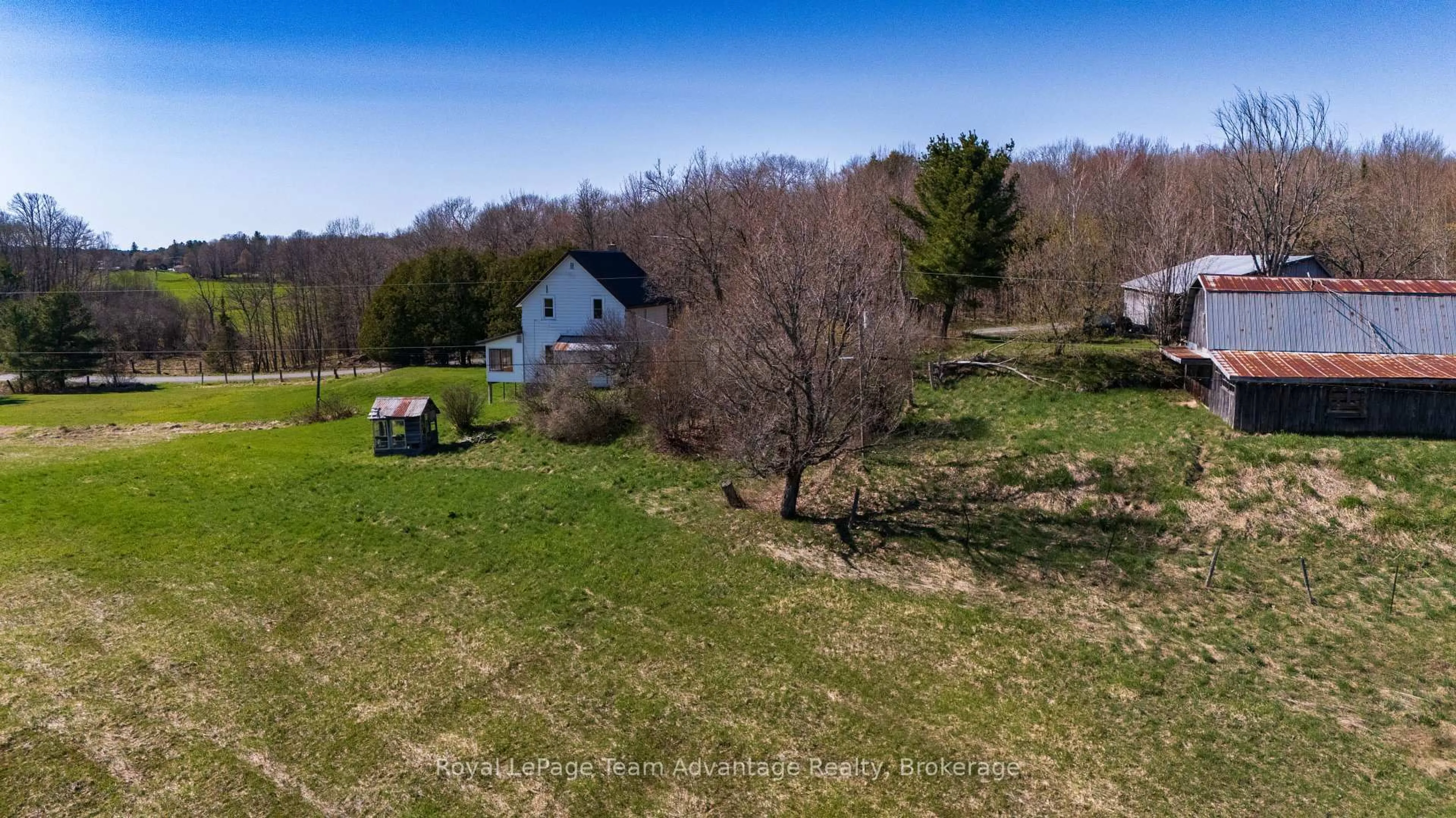 A pic from outside/outdoor area/front of a property/back of a property/a pic from drone, water/lake/river/ocean view for 77 Lakeshore Rd, McKellar Ontario P0G 1C0