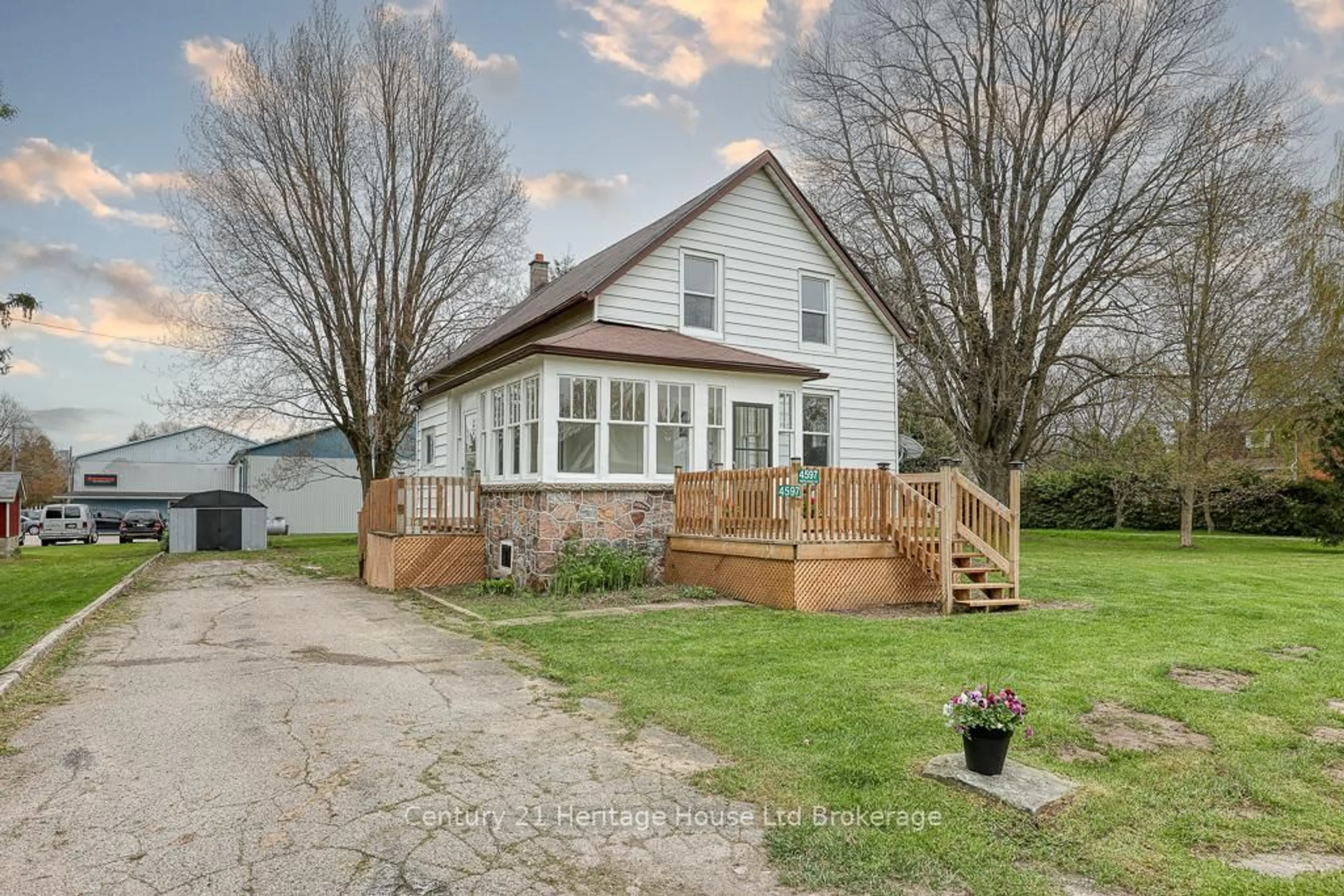 A pic from outside/outdoor area/front of a property/back of a property/a pic from drone, street for 4597 Perth County Rd 135 Rd, Perth East Ontario N0K 1X0