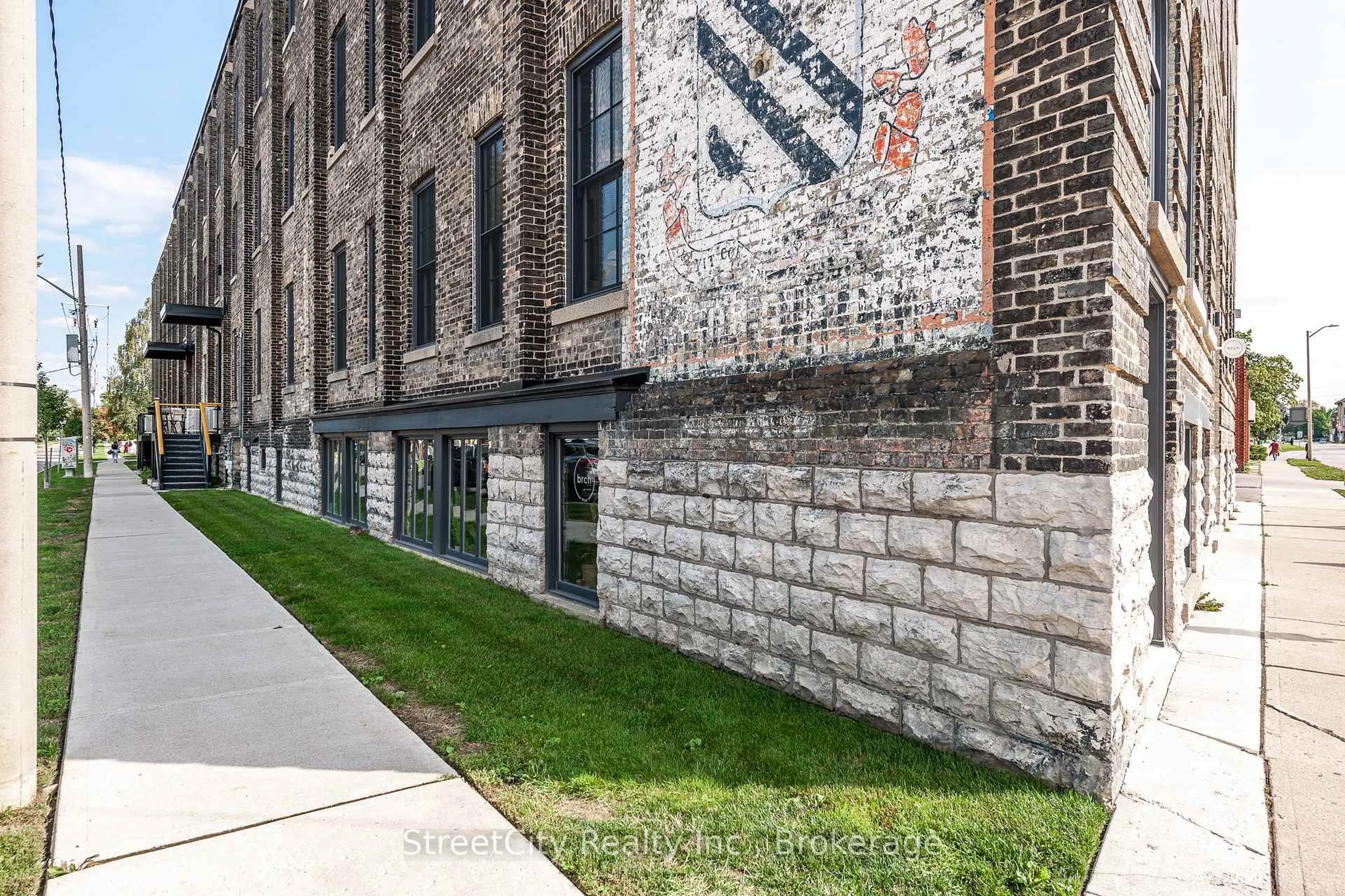 Home with brick exterior material, building for 245 Downie St #104, Stratford Ontario N5A 1X5
