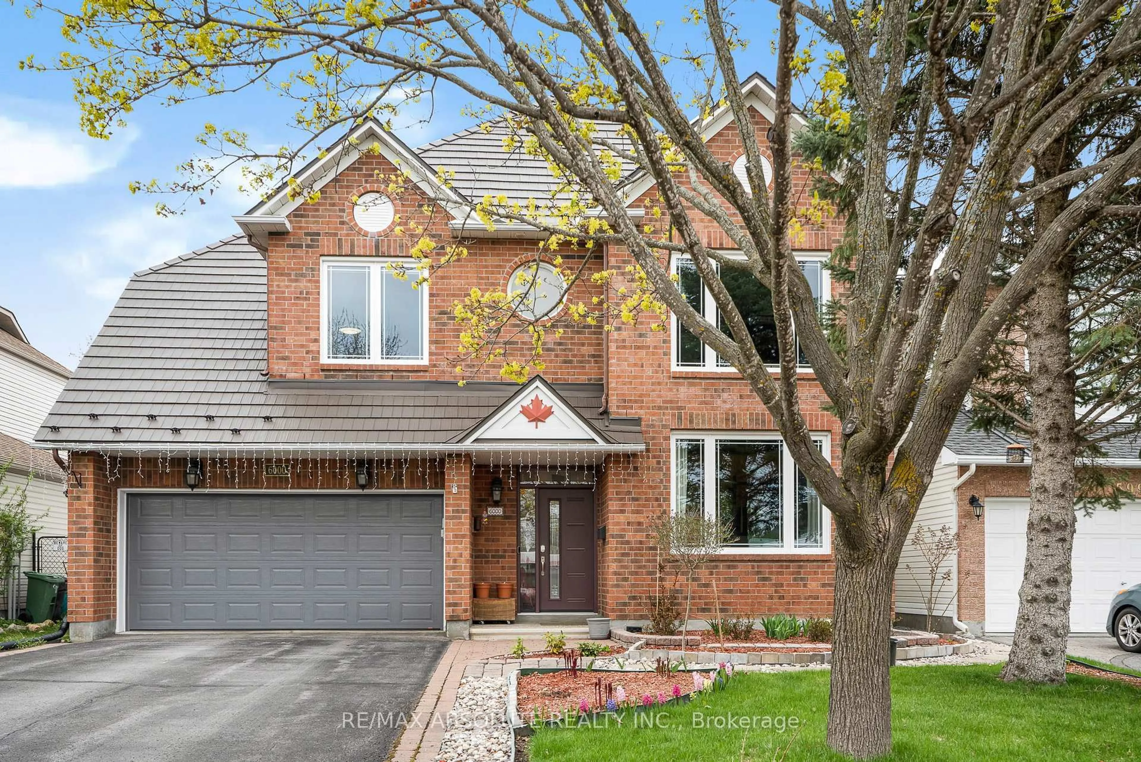 Home with brick exterior material, street for 6000 Longleaf Dr, Orleans Ontario K1W 1J2