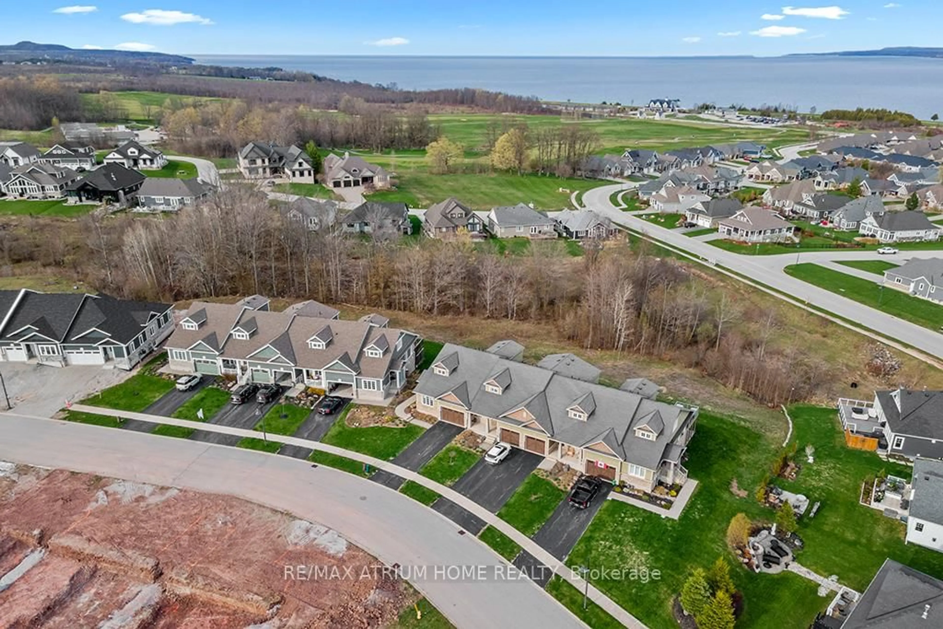 A pic from outside/outdoor area/front of a property/back of a property/a pic from drone, water/lake/river/ocean view for 307 Telford Tr #4, Georgian Bluffs Ontario N0H 1S0