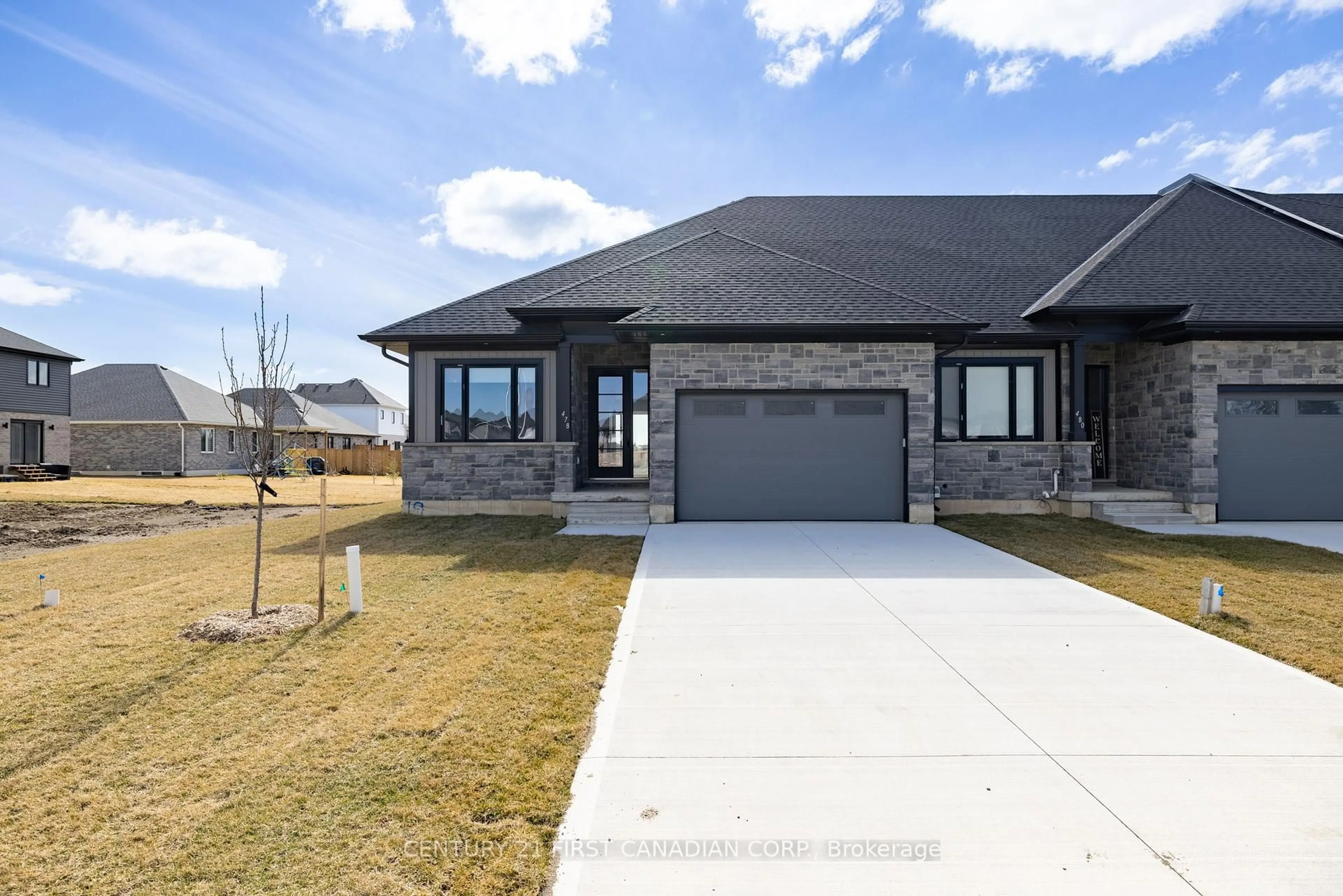 Home with brick exterior material, street for 32 Postma Cres #5, North Middlesex Ontario N0M 1A0
