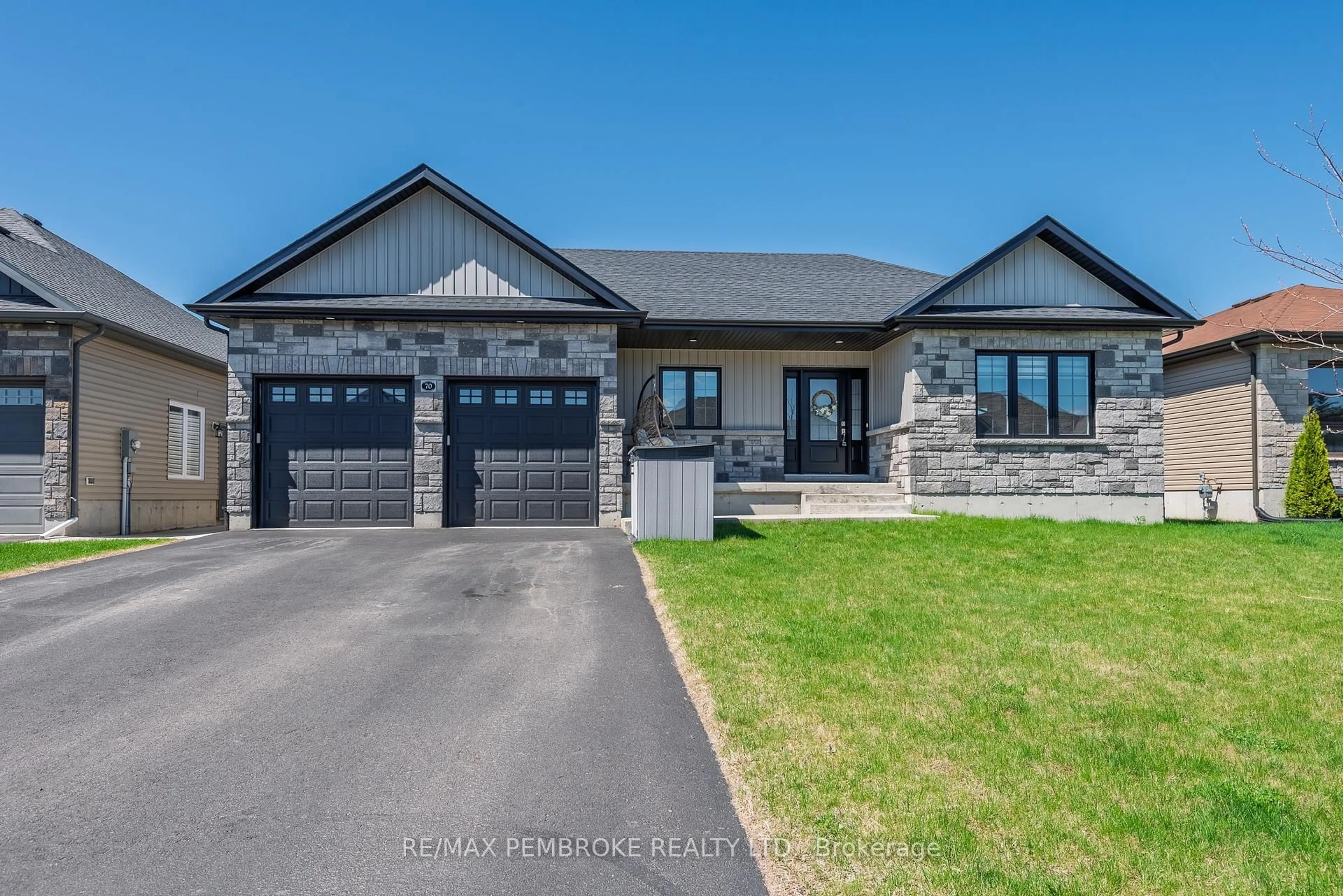 Home with brick exterior material, street for 70 Noble Cres, Petawawa Ontario K8H 0E9