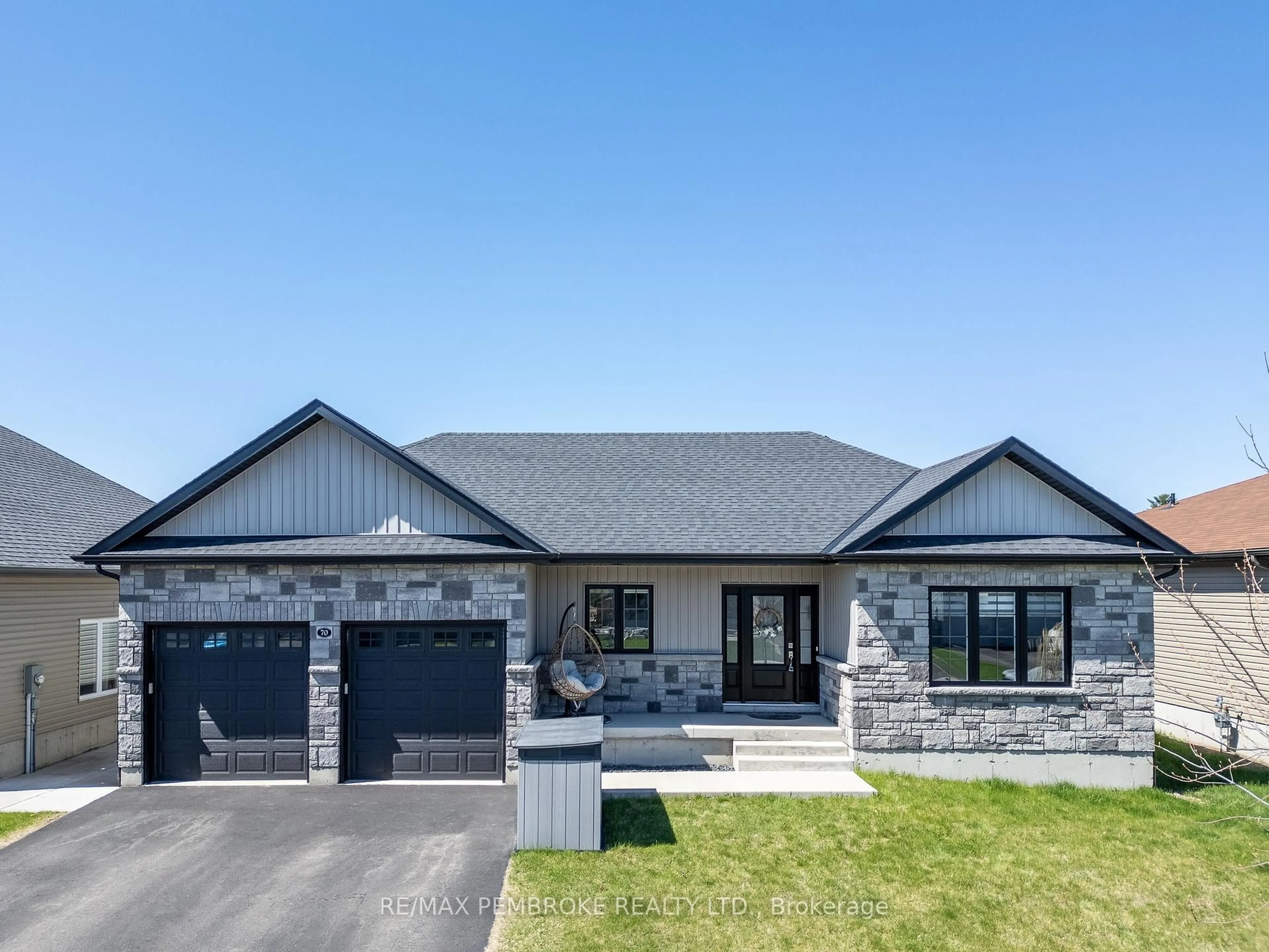 Home with brick exterior material, street for 70 Noble Cres, Petawawa Ontario K8H 0E9