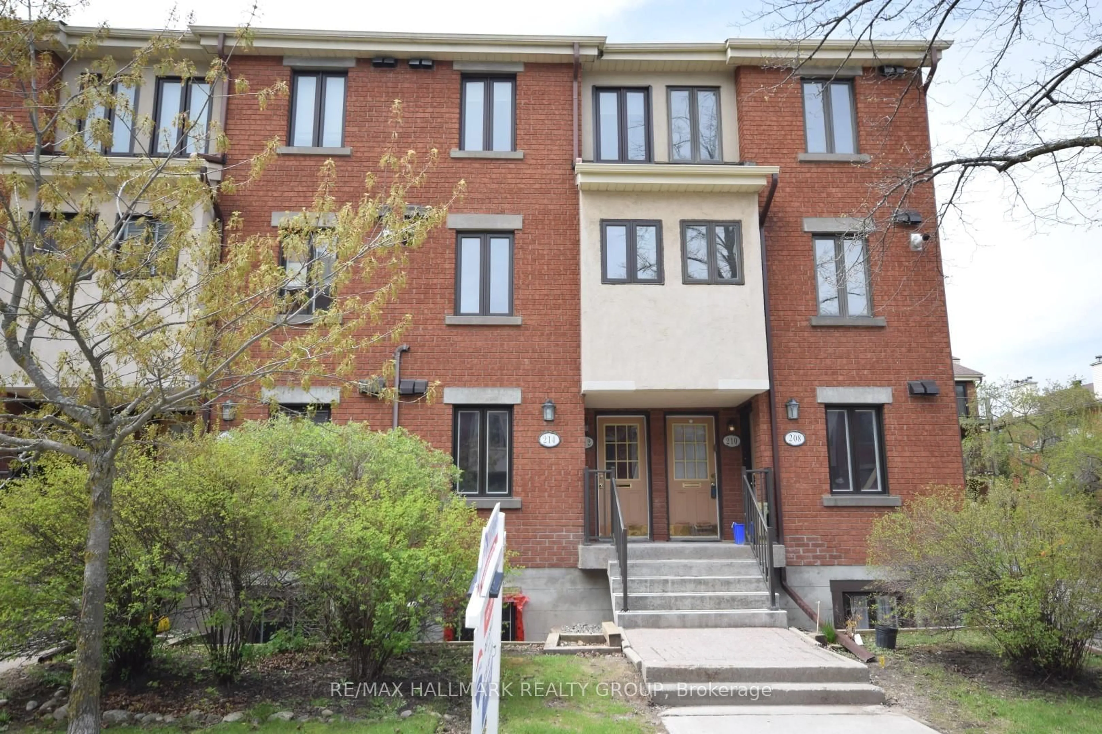 Home with brick exterior material, street for 214 Alvin Rd, Ottawa Ontario K1K 2V1