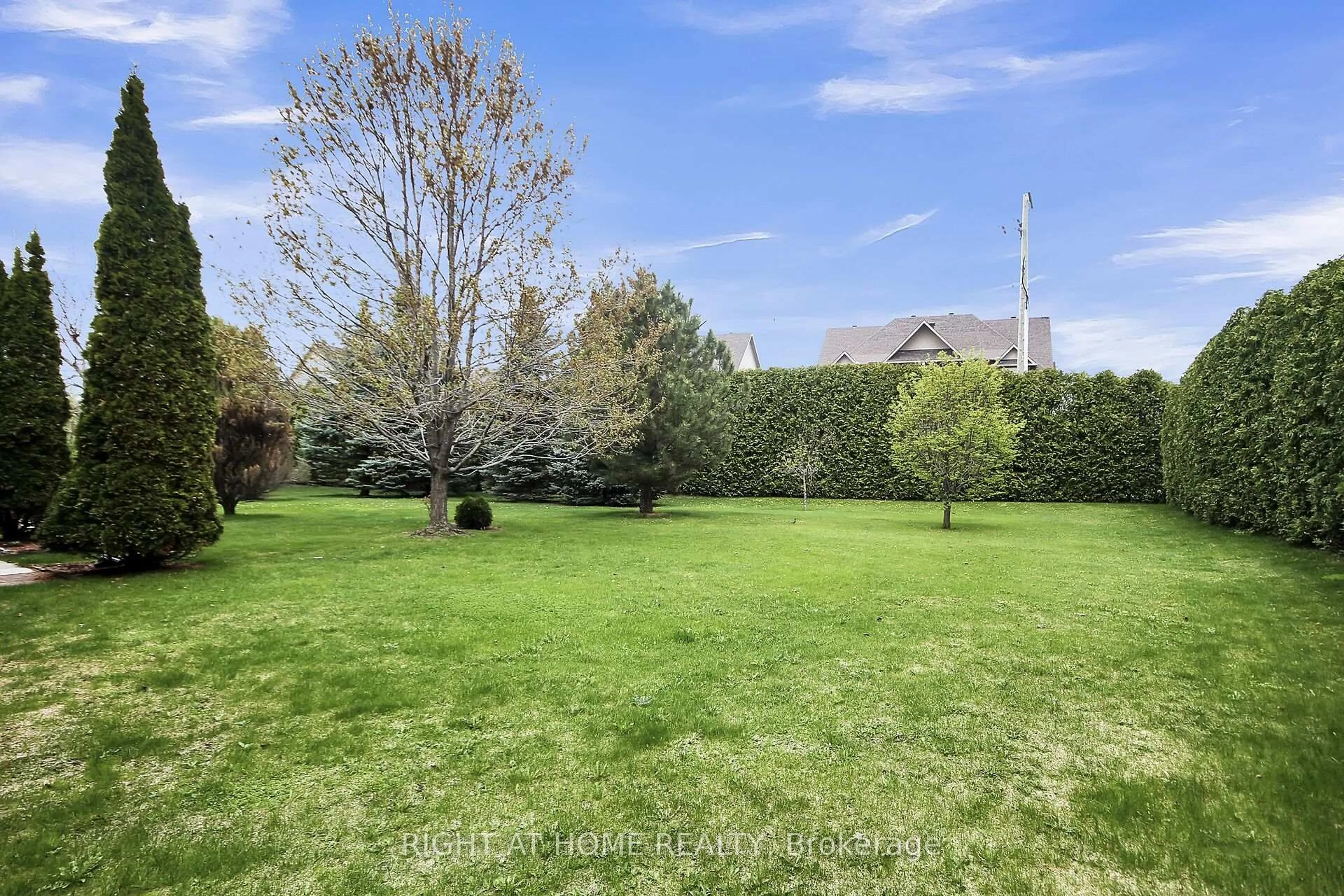 A pic from outside/outdoor area/front of a property/back of a property/a pic from drone, forest/trees view for 1 Eileen Cres, Stittsville Ontario K2S 1M3