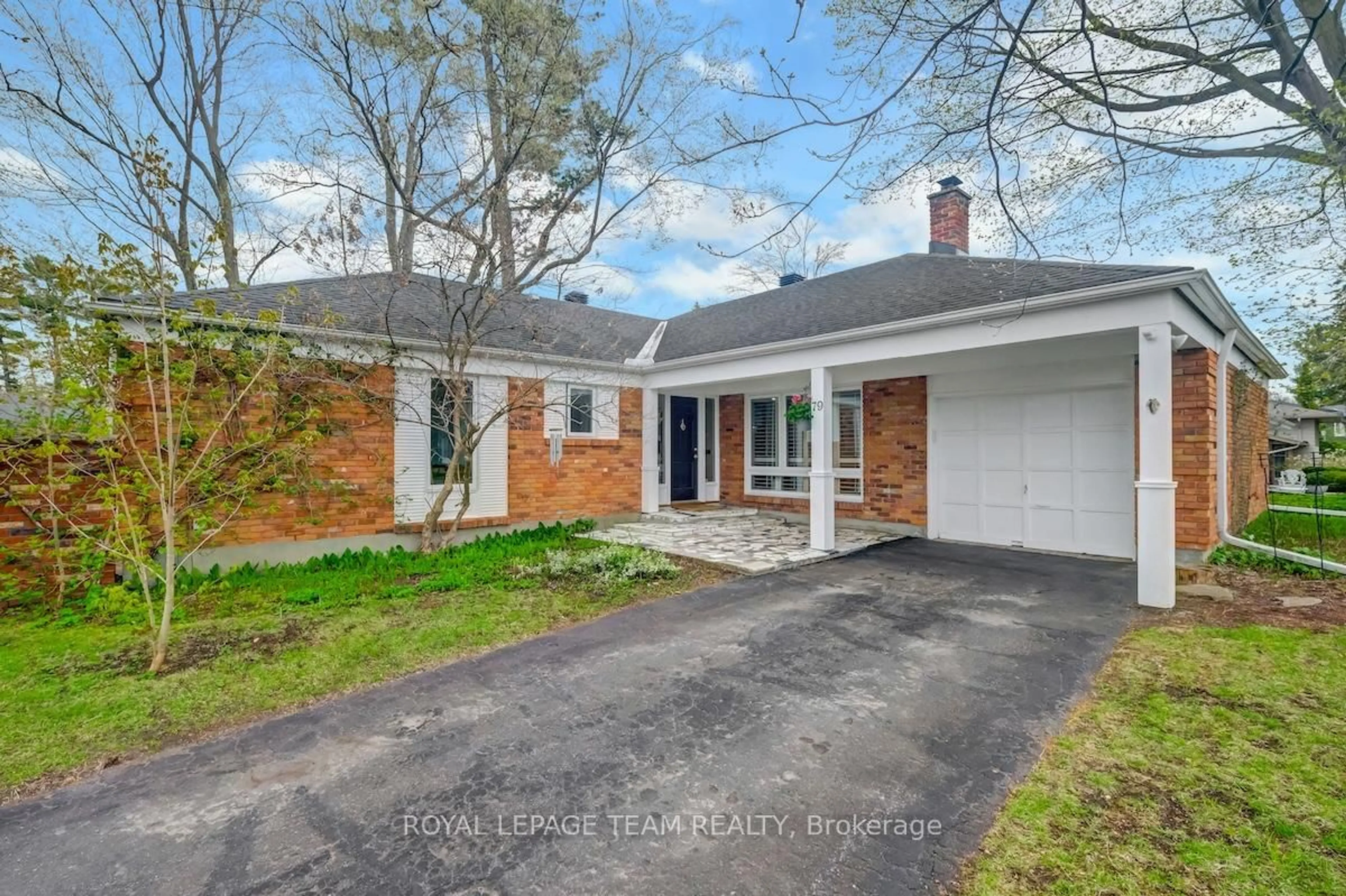 Home with brick exterior material, street for 79 Parkland Cres, Ottawa Ontario K2H 7V9