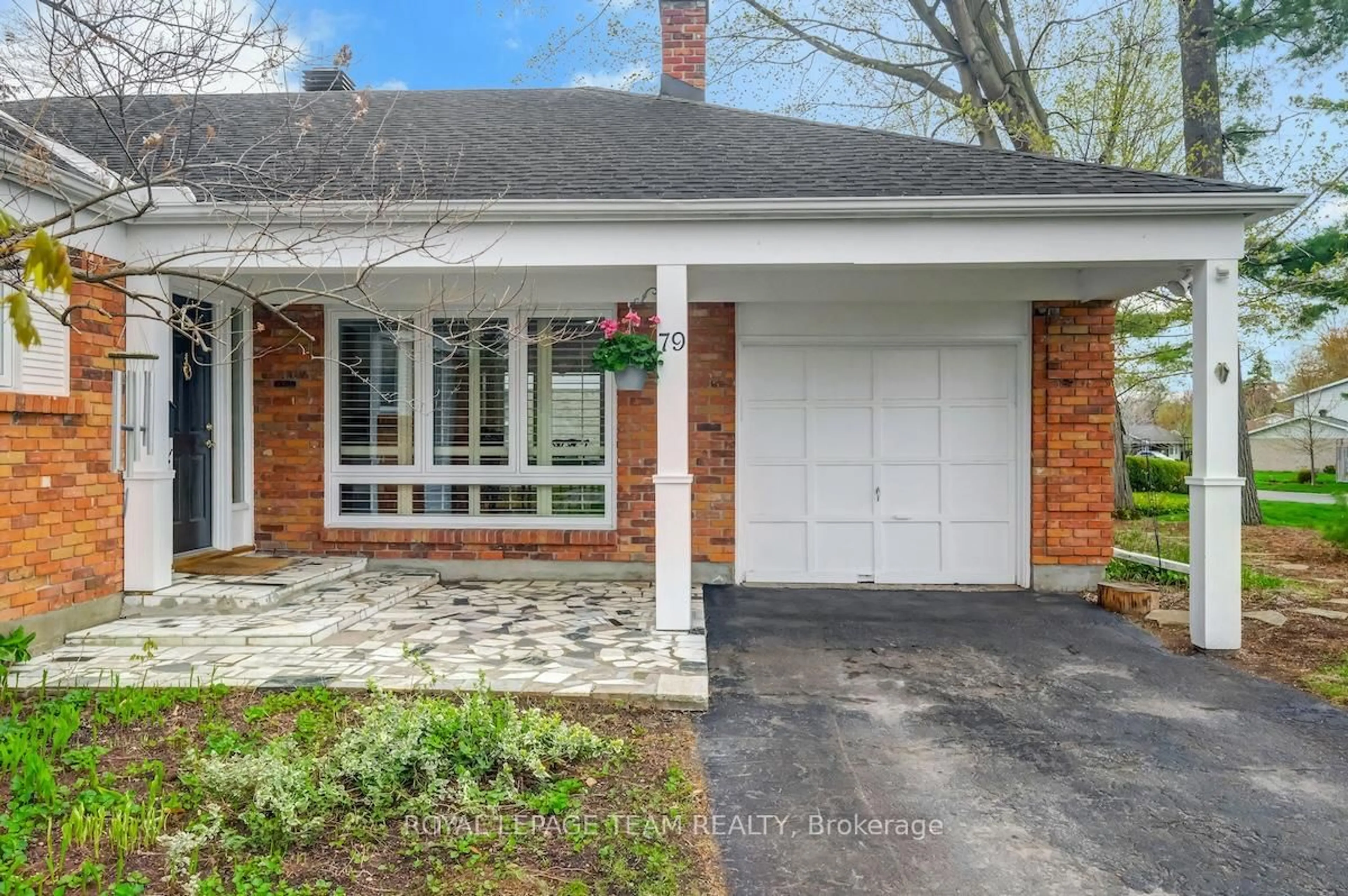 Home with brick exterior material, street for 79 Parkland Cres, Ottawa Ontario K2H 7V9