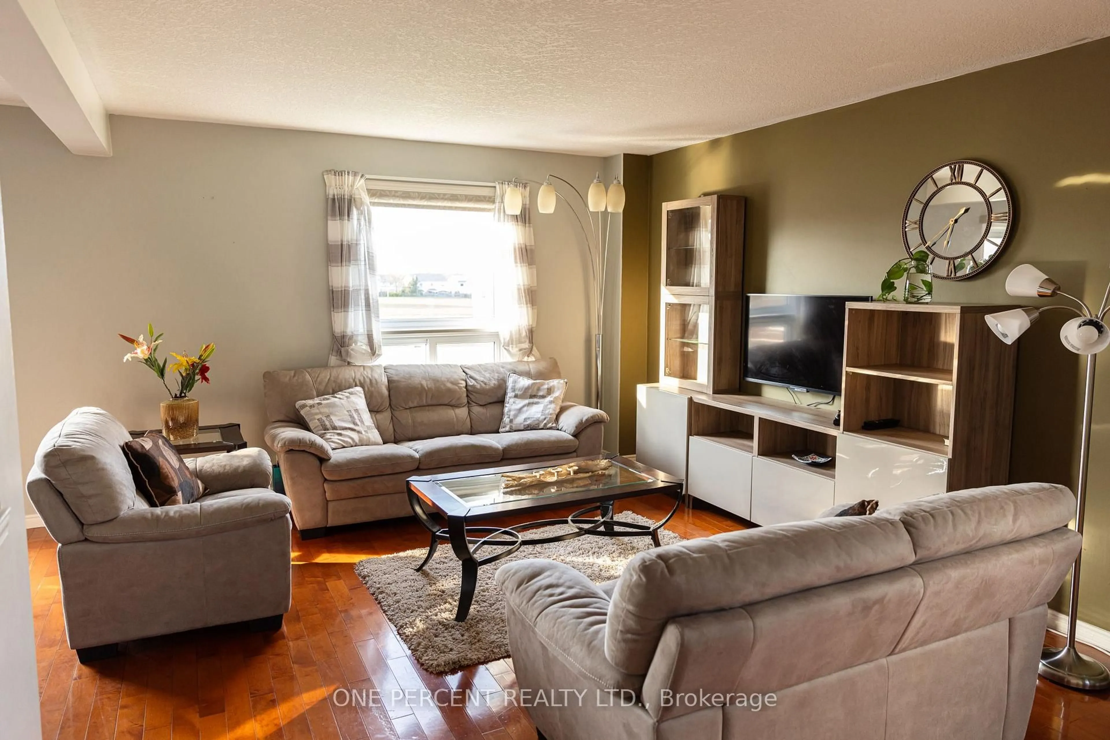 Living room with furniture, wood/laminate floor for 160 Hidden Creek Dr, Kitchener Ontario N2N 3N6