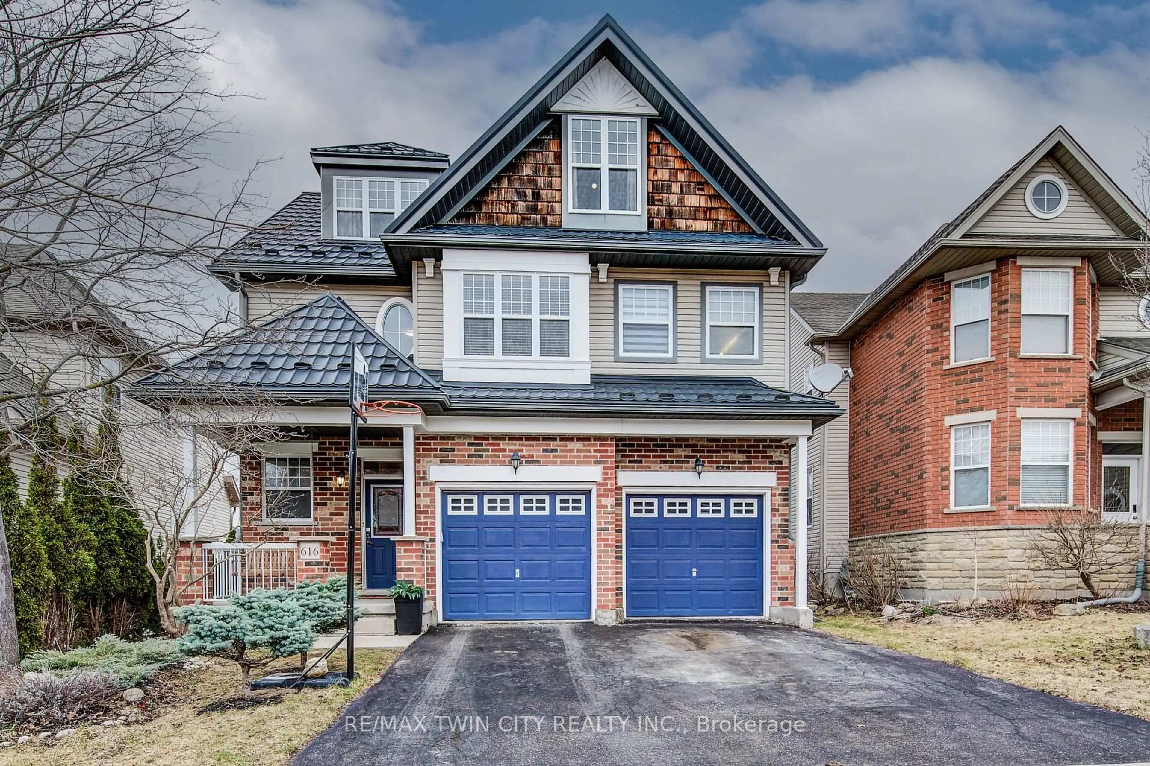 Home with brick exterior material, street for 616 Frieburg Dr, Waterloo Ontario N2T 2Y4