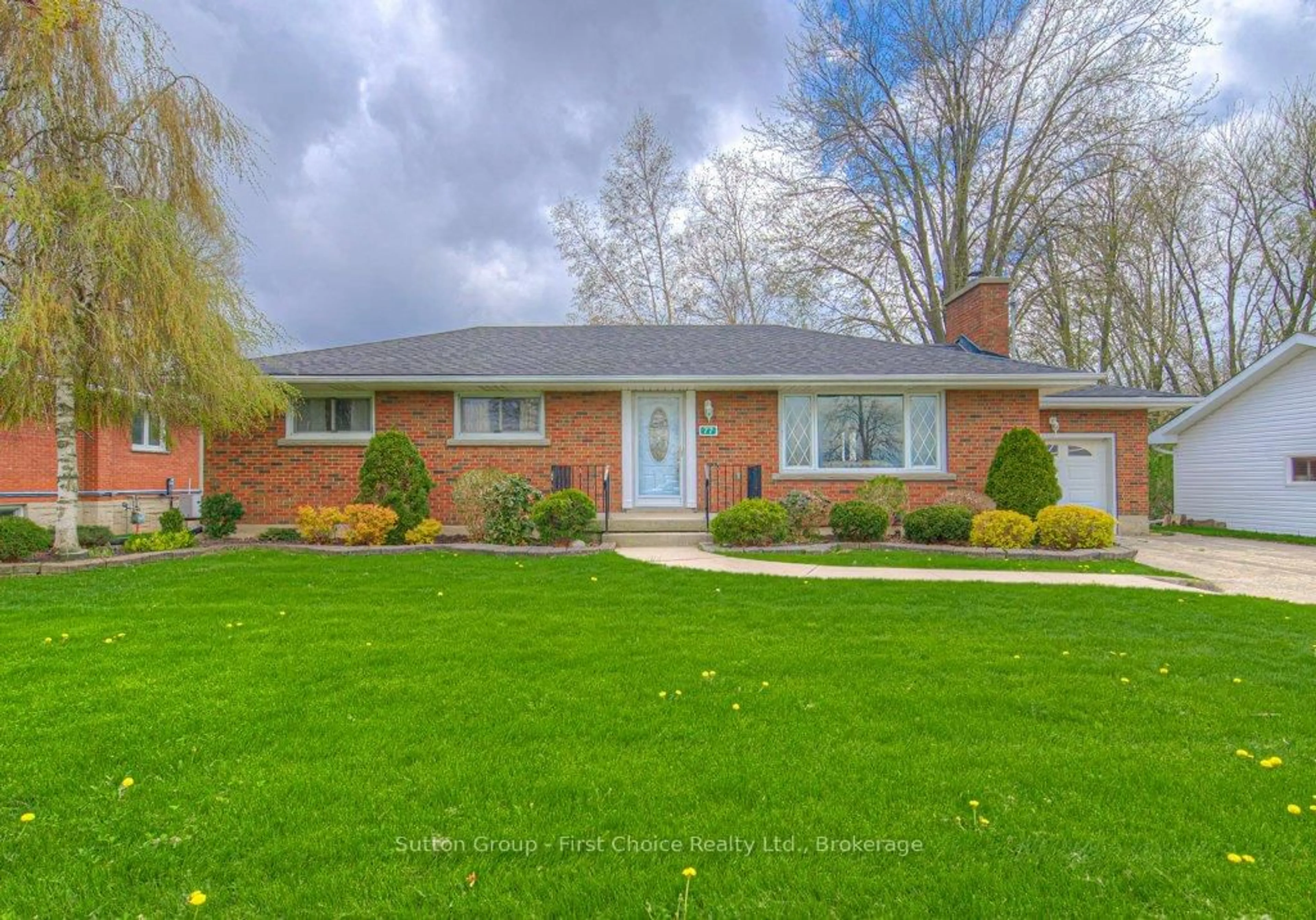 Home with brick exterior material, street for 77 Huron Rd, Perth South Ontario N0K 1X0