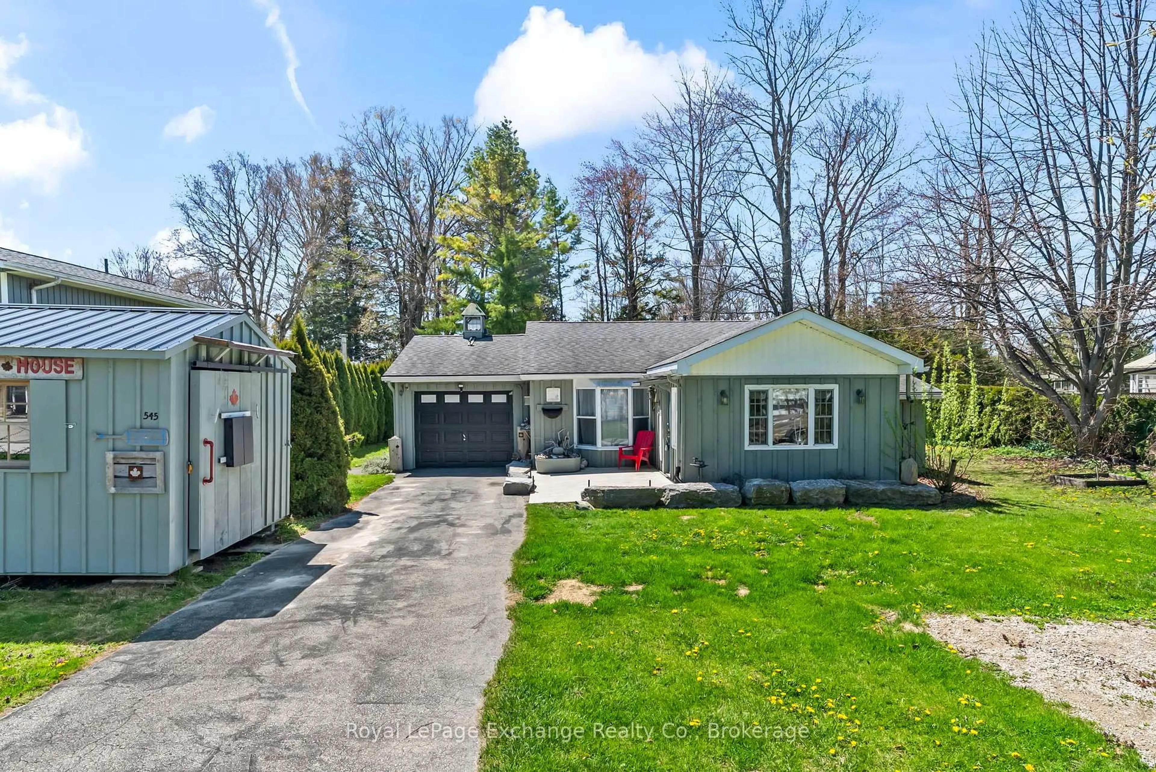 Home with vinyl exterior material, street for 545 Attawandaron Rd, Huron-Kinloss Ontario N2Z 2X3