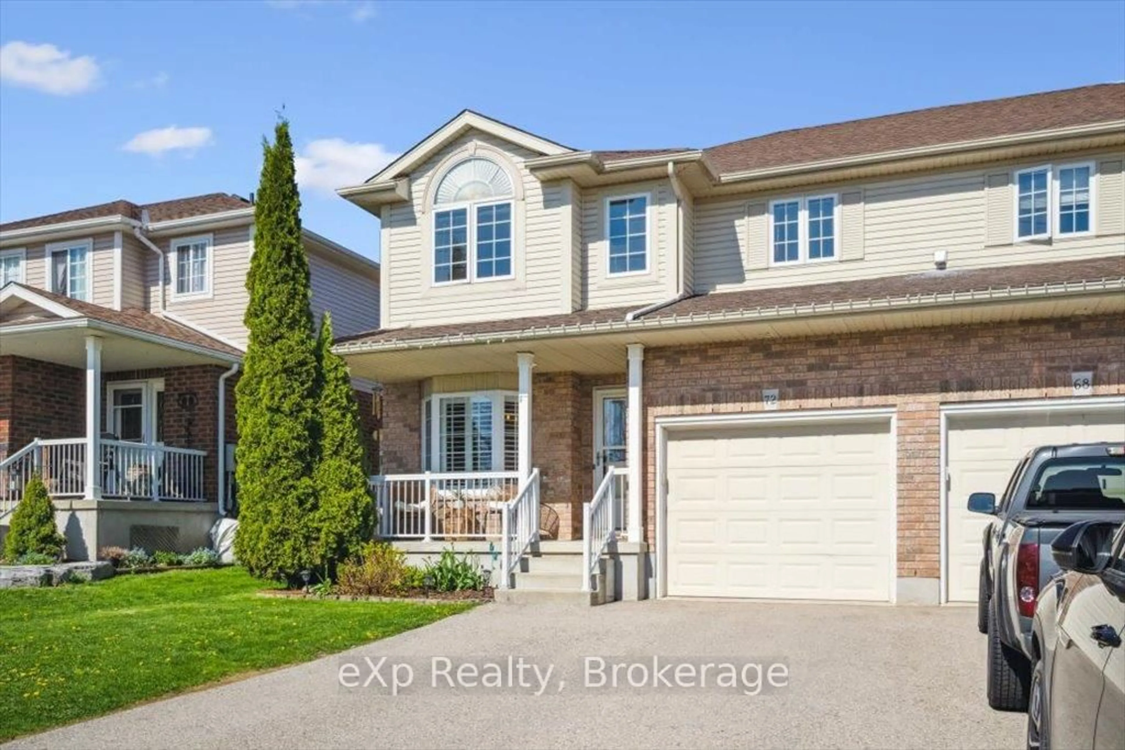 Home with brick exterior material, street for 72 Raising Mill Gate, Woolwich Ontario N3B 3N5