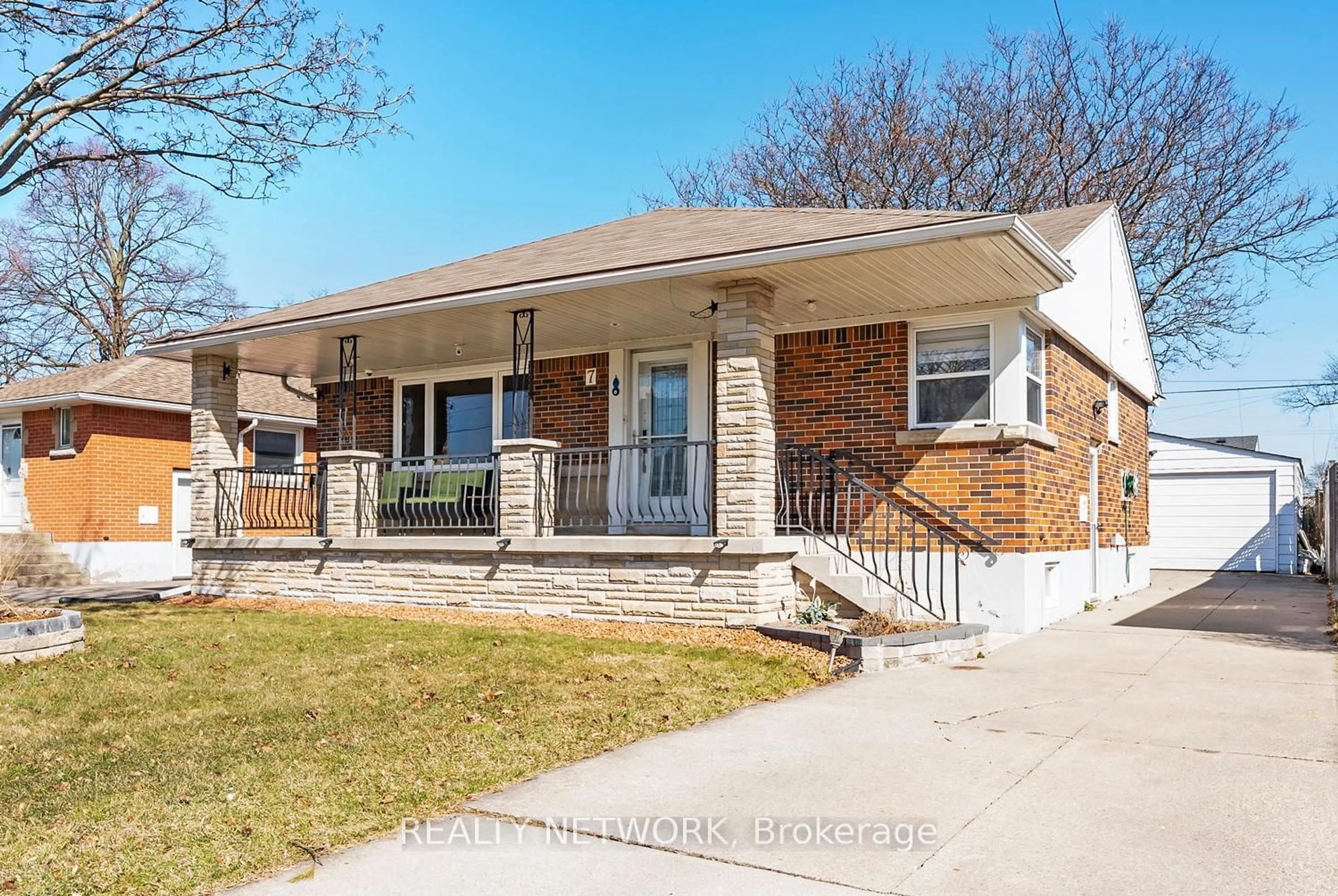 Home with brick exterior material, street for 7 Greenwood St, Hamilton Ontario L8T 3N2