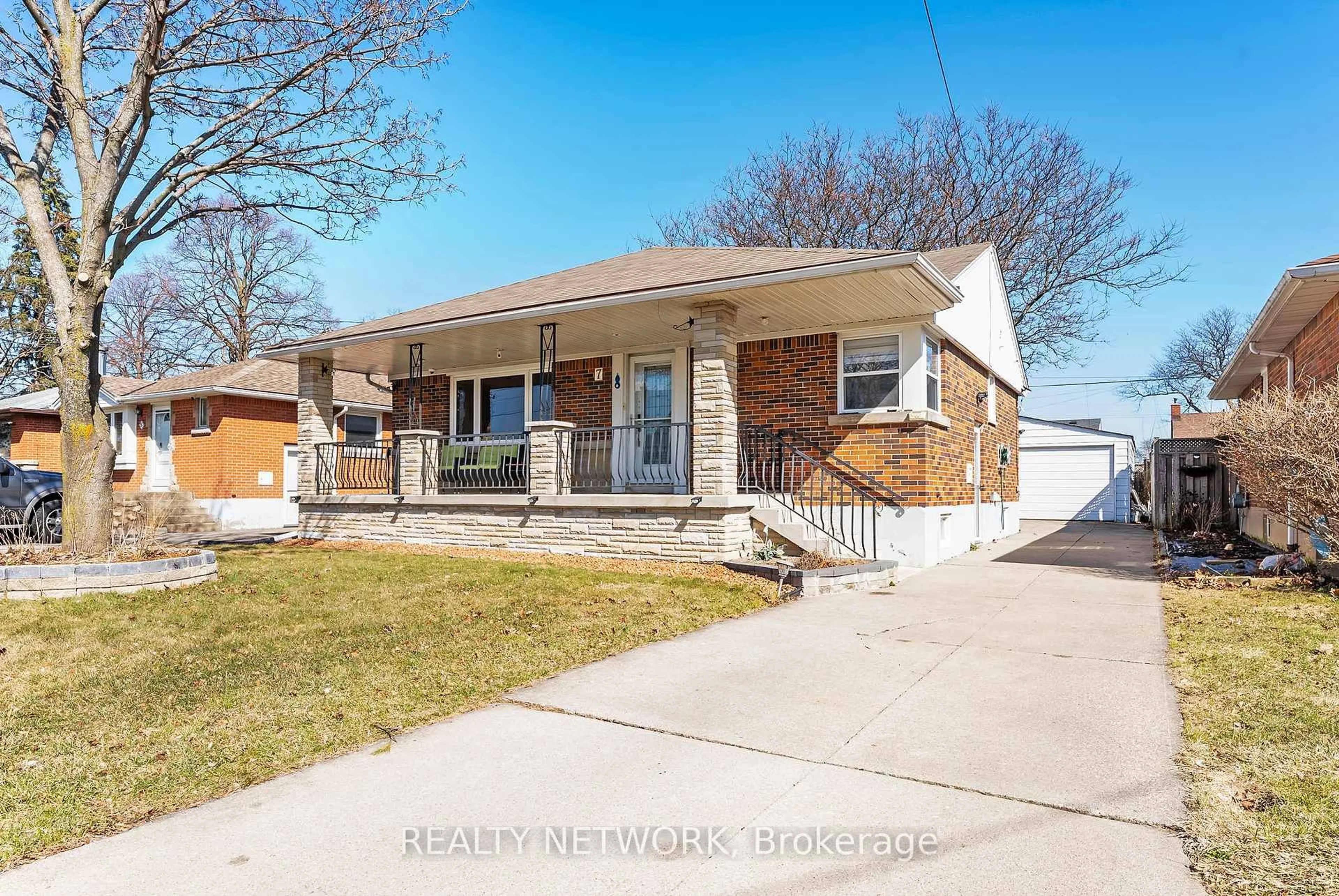 Home with brick exterior material, street for 7 Greenwood St, Hamilton Ontario L8T 3N2