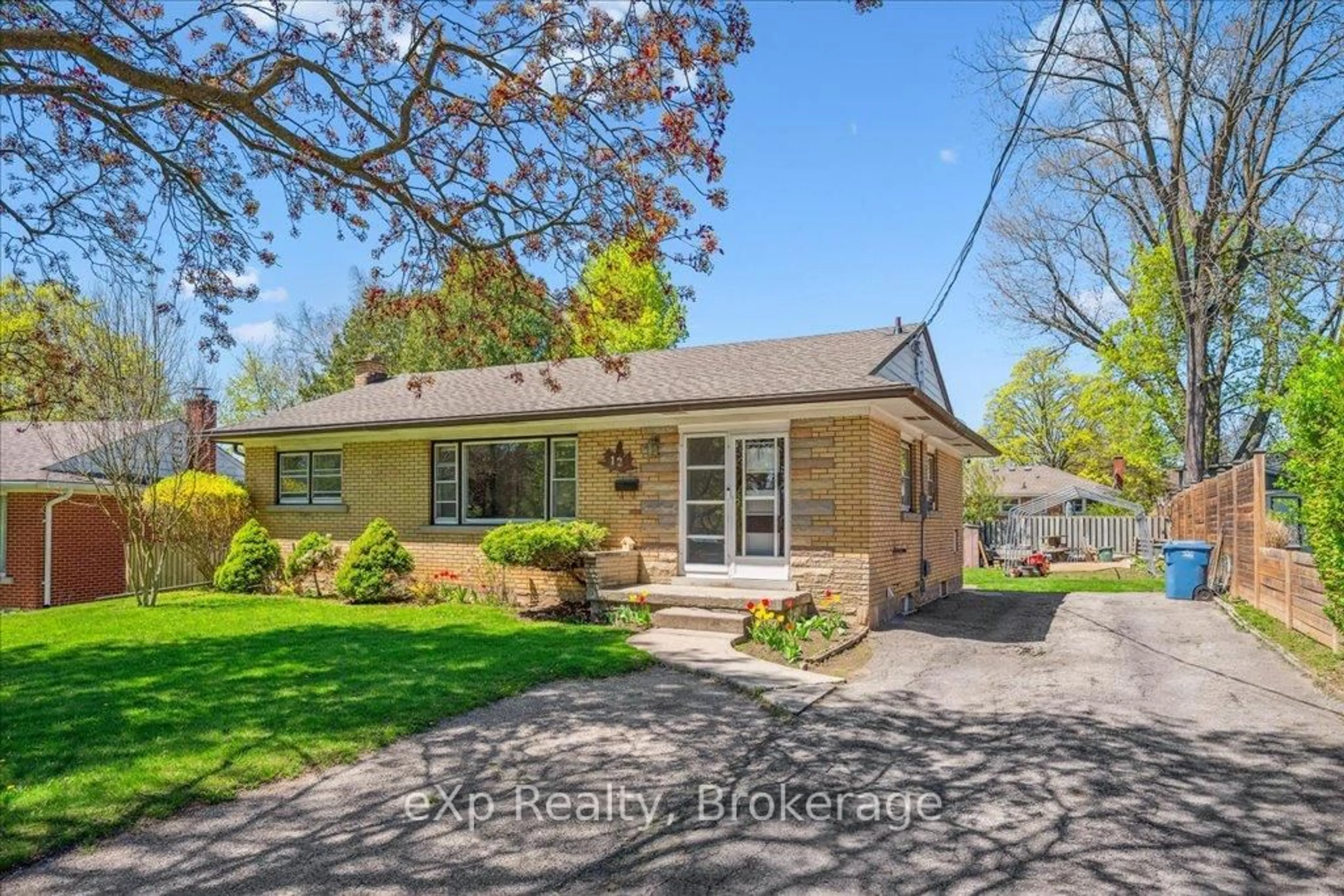 Home with brick exterior material, street for 12 Lincoln Cres, Guelph Ontario N1E 1Y8