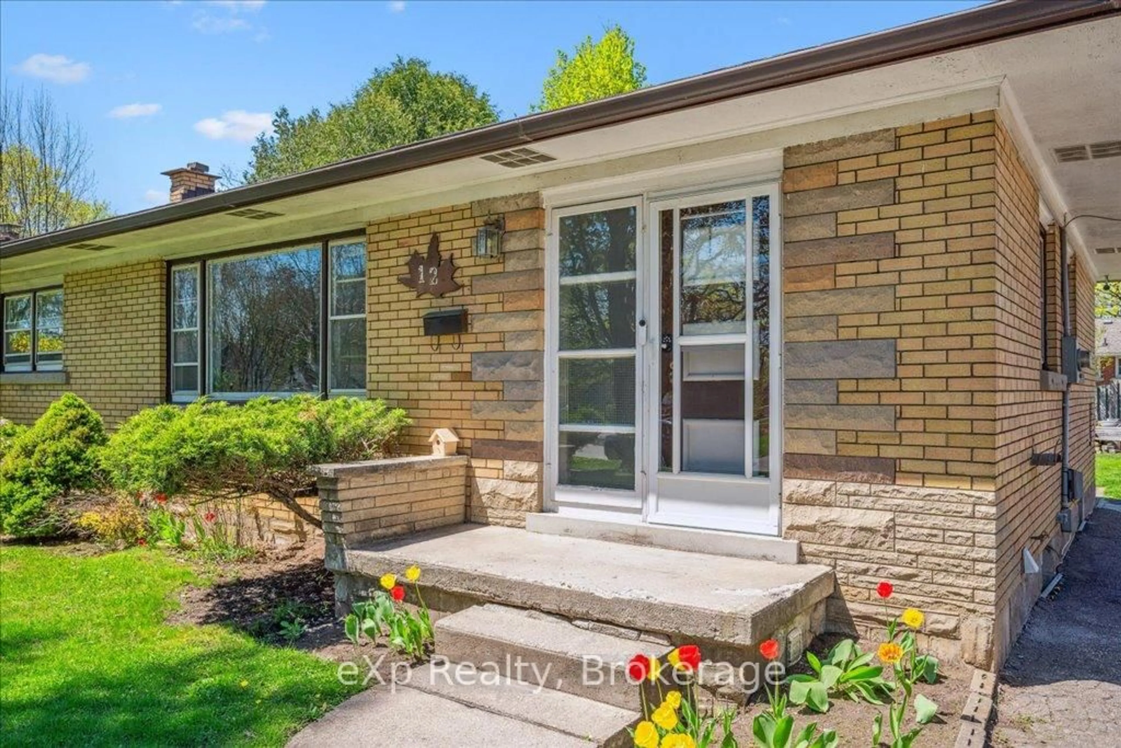 Home with brick exterior material, street for 12 Lincoln Cres, Guelph Ontario N1E 1Y8
