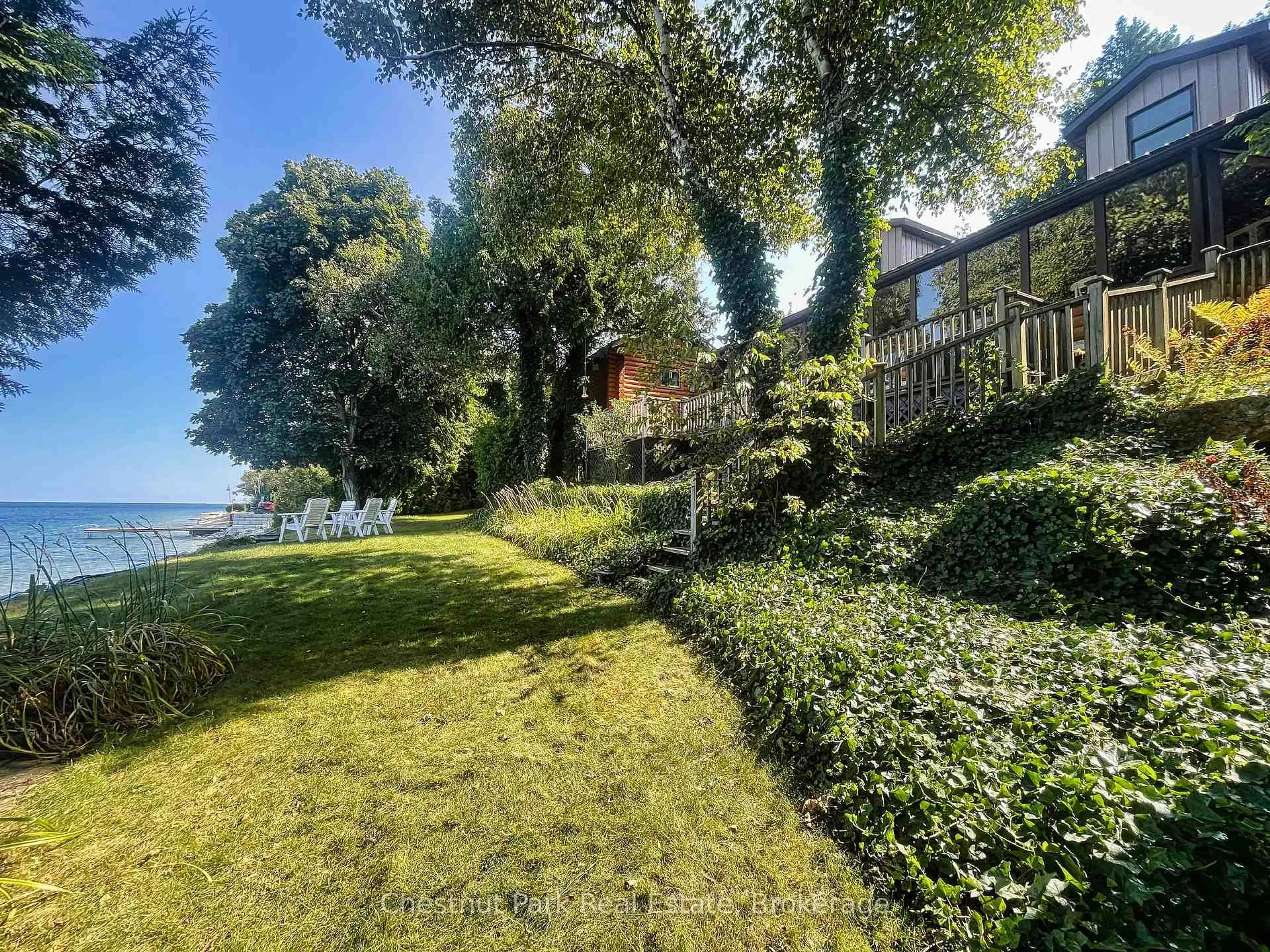 A pic from outside/outdoor area/front of a property/back of a property/a pic from drone, water/lake/river/ocean view for 36 William St, Northern Bruce Peninsula Ontario N0H 1W0