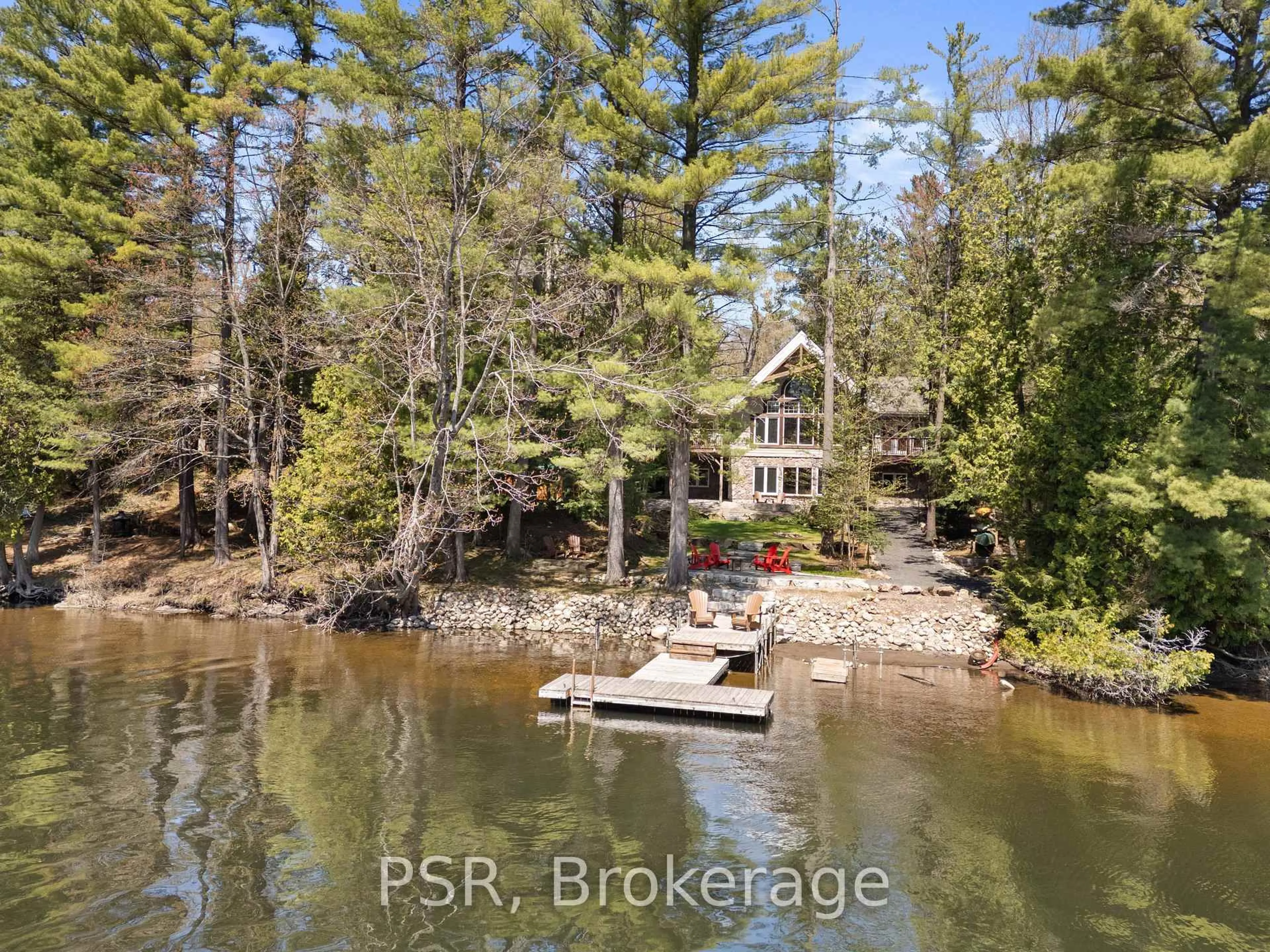 A pic from outside/outdoor area/front of a property/back of a property/a pic from drone, water/lake/river/ocean view for 1049 Catherine Bagley Rd, Gravenhurst Ontario P0E 1N0