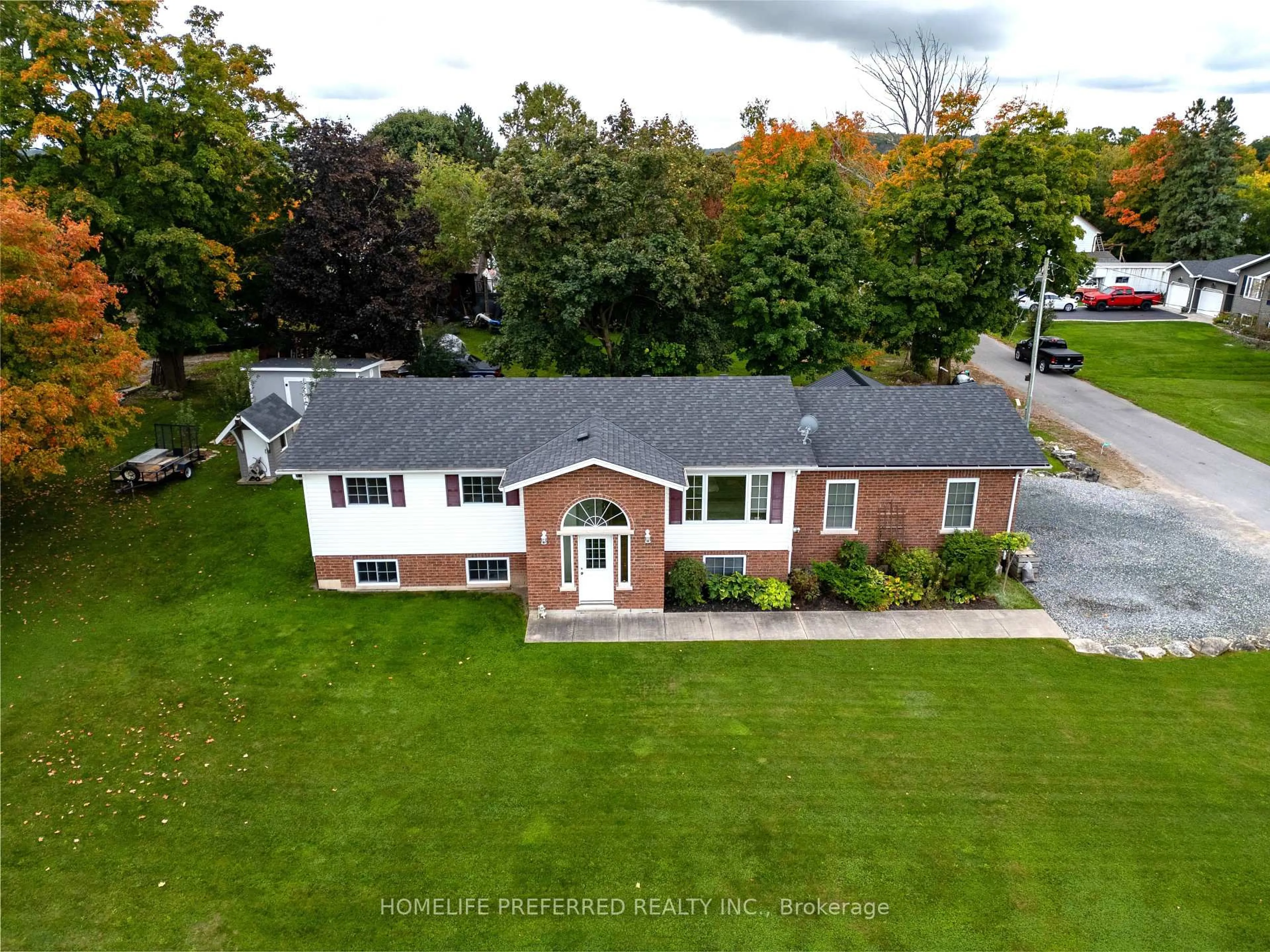 A pic from outside/outdoor area/front of a property/back of a property/a pic from drone, street for 2445 Workman St, Cavan Monaghan Ontario L0A 1C0