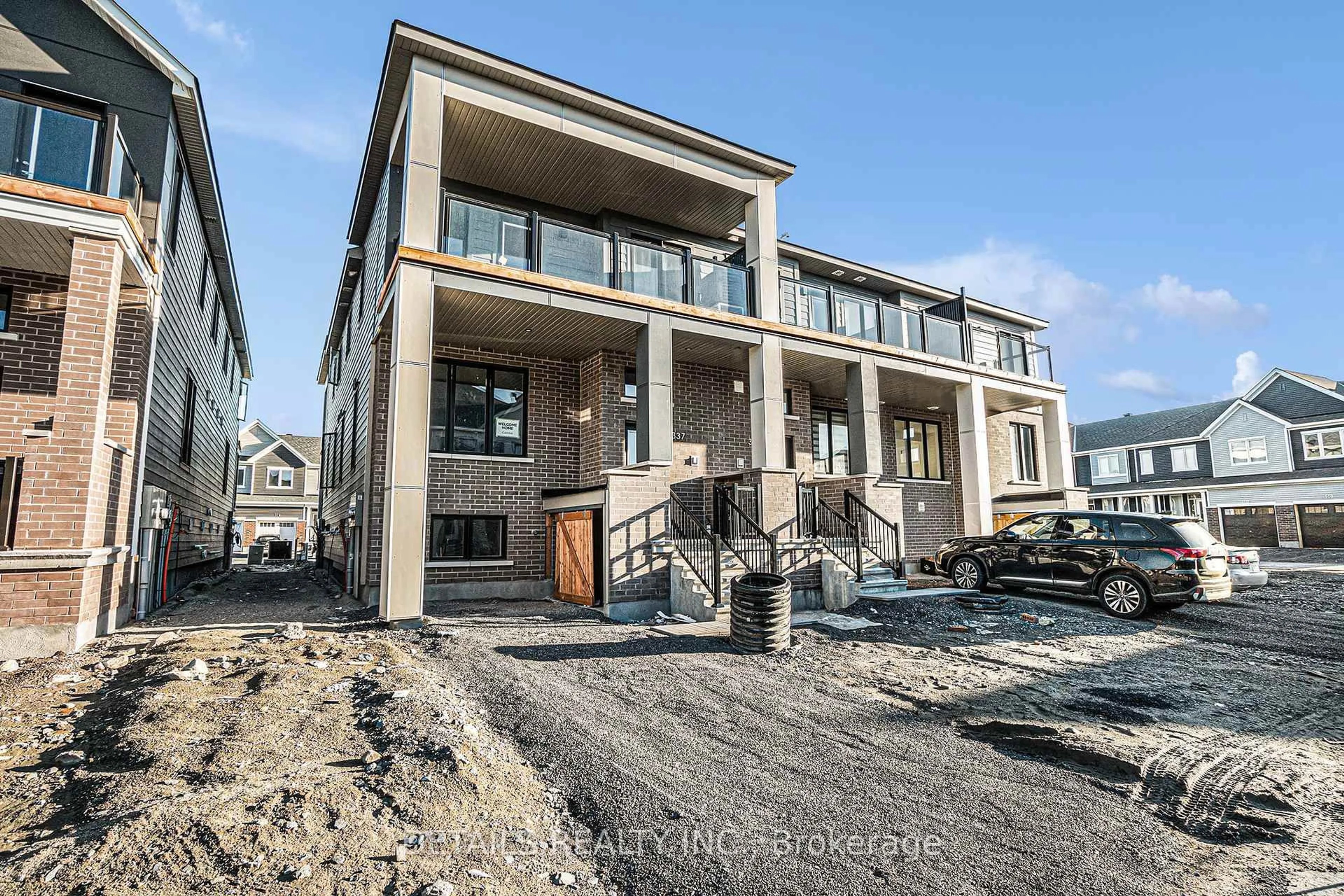 Home with brick exterior material, street for 337 Catsfoot Walk, Ottawa Ontario K2J 7G7