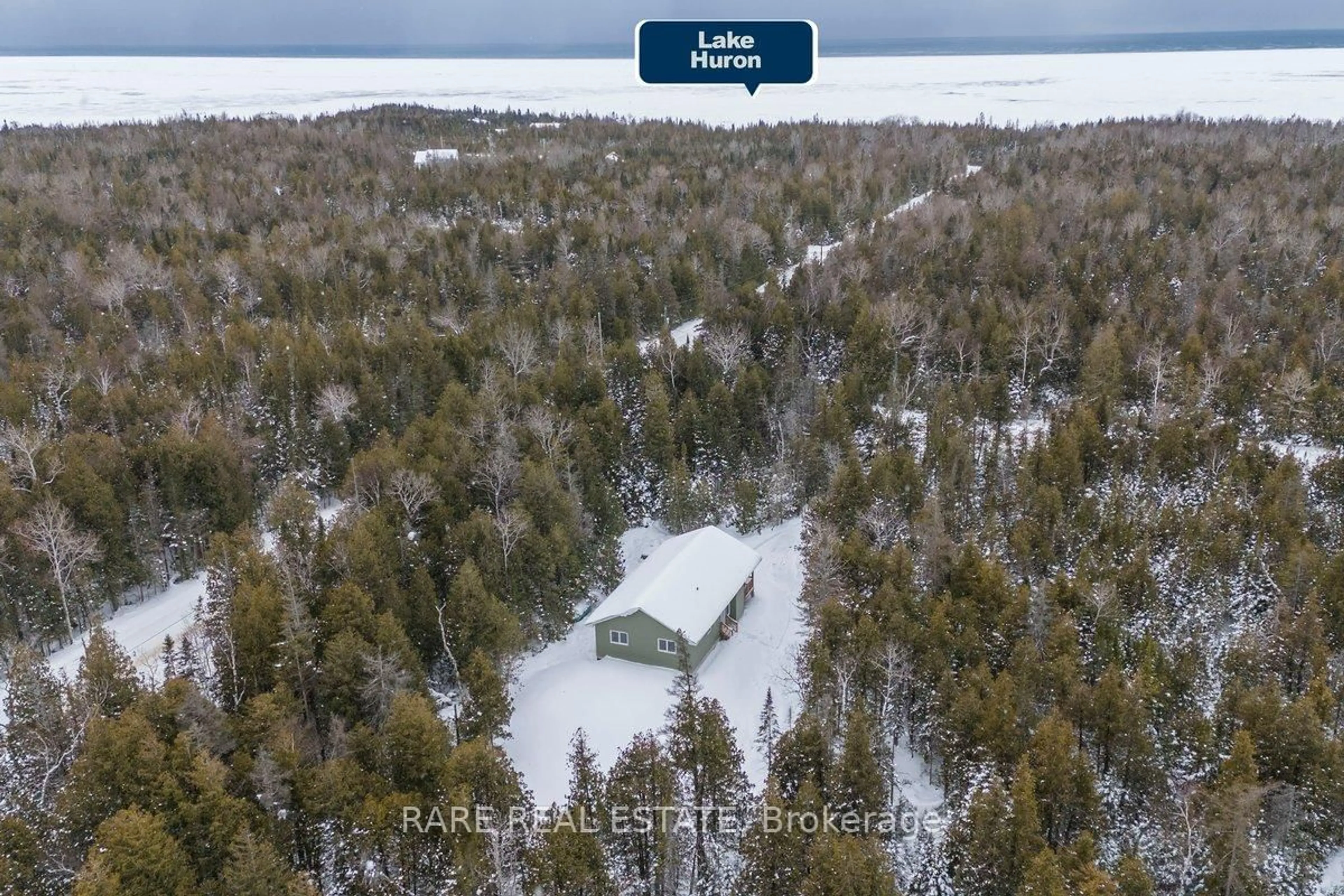 A pic from outside/outdoor area/front of a property/back of a property/a pic from drone, water/lake/river/ocean view for 6 Pike St, Northern Bruce Peninsula Ontario N0H 1W0