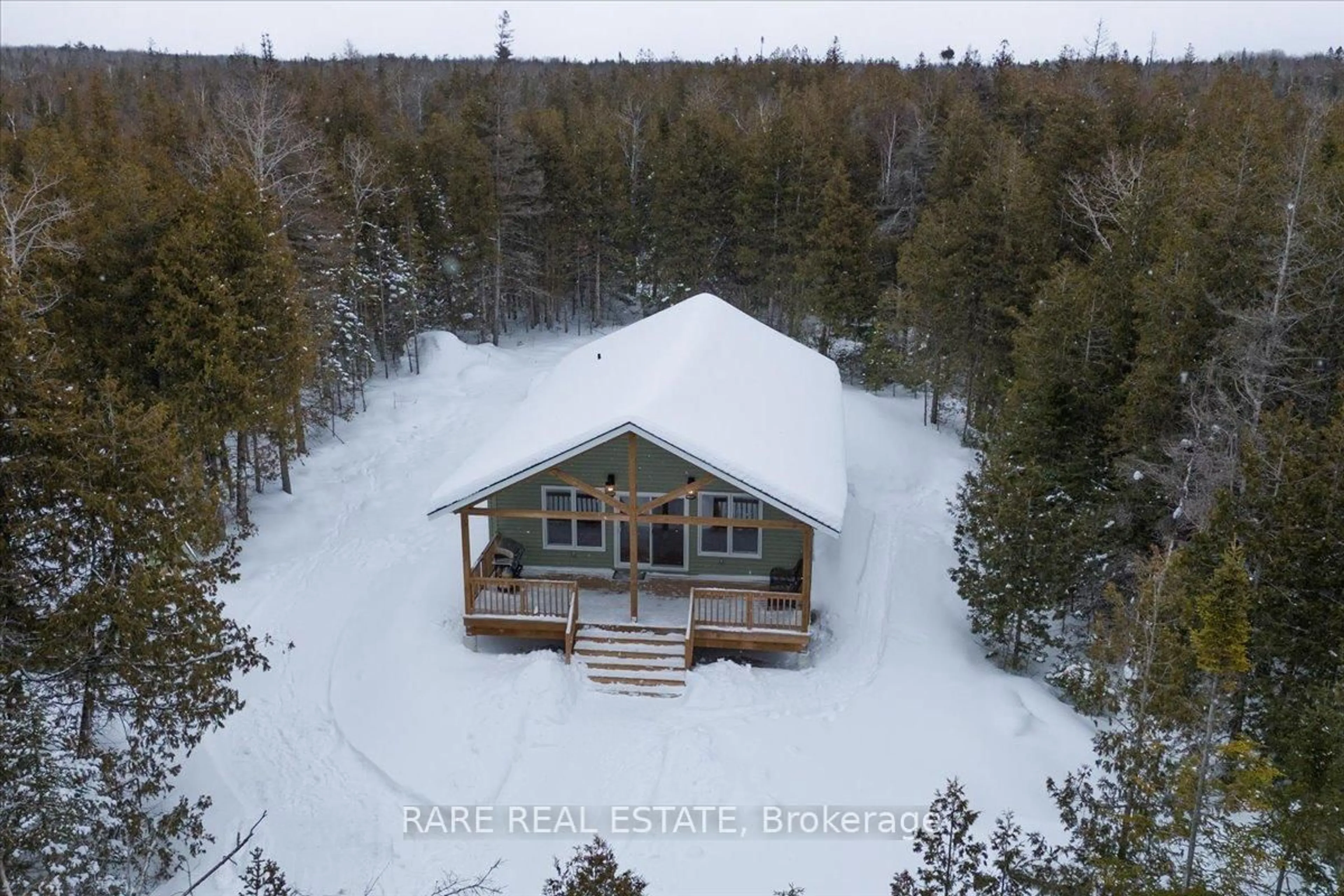 A pic from outside/outdoor area/front of a property/back of a property/a pic from drone, unknown for 6 Pike St, Northern Bruce Peninsula Ontario N0H 1W0