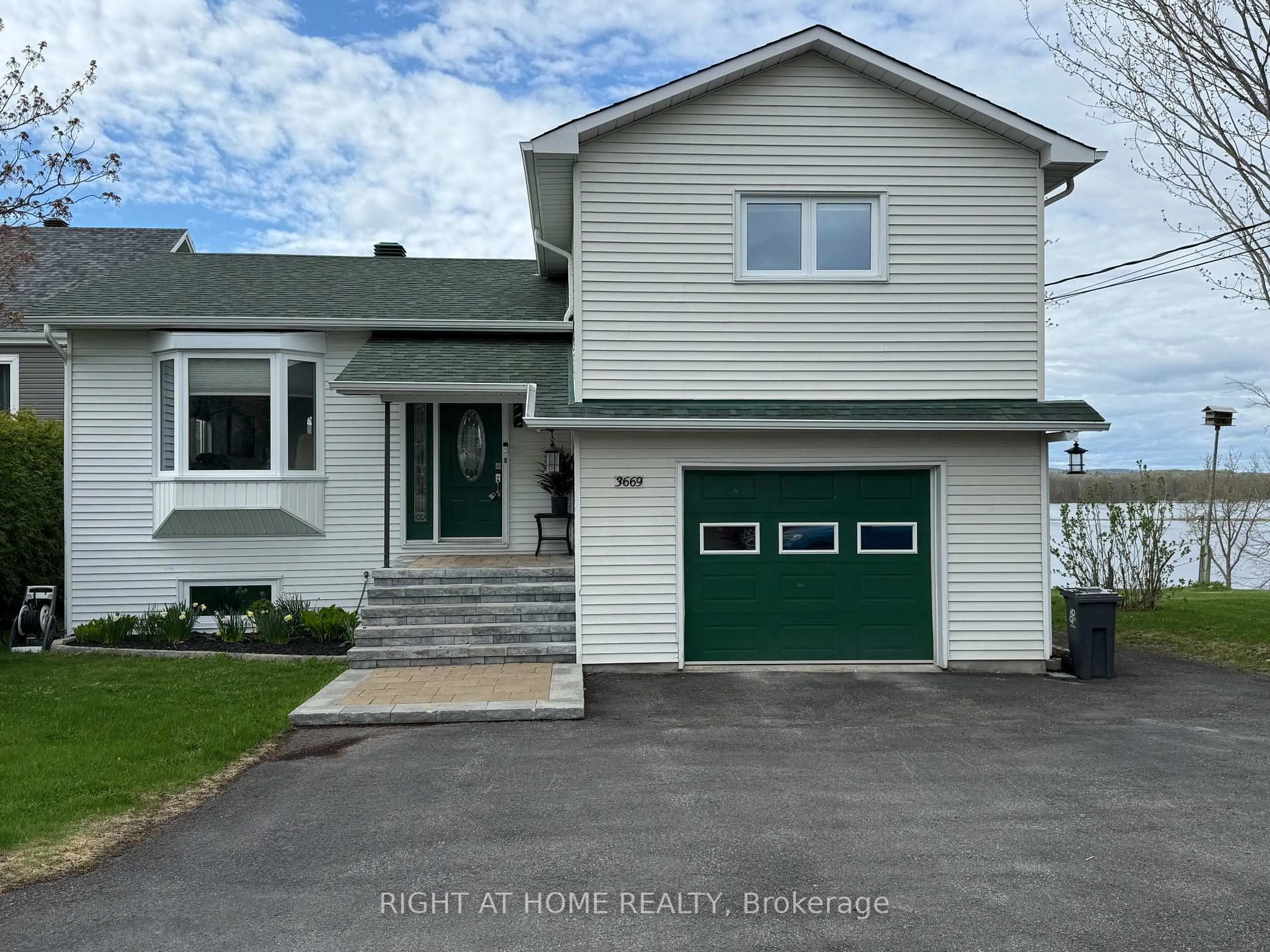 Home with vinyl exterior material, street for 3669 Rue Principale St, Alfred and Plantagenet Ontario K0A 3K0