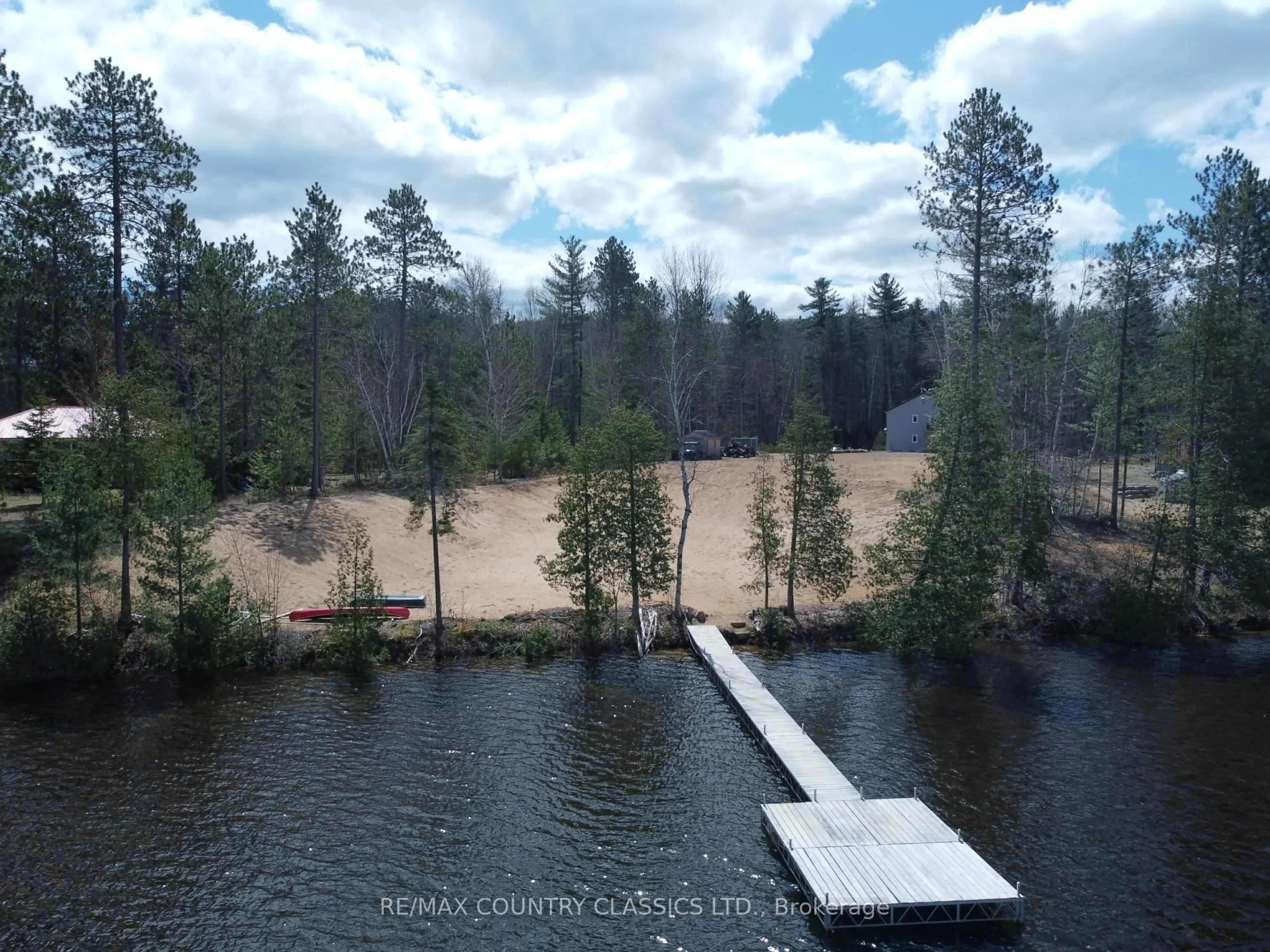A pic from outside/outdoor area/front of a property/back of a property/a pic from drone, water/lake/river/ocean view for 237 Grunwald Rd, Barry's Bay Ontario K0J 1B0