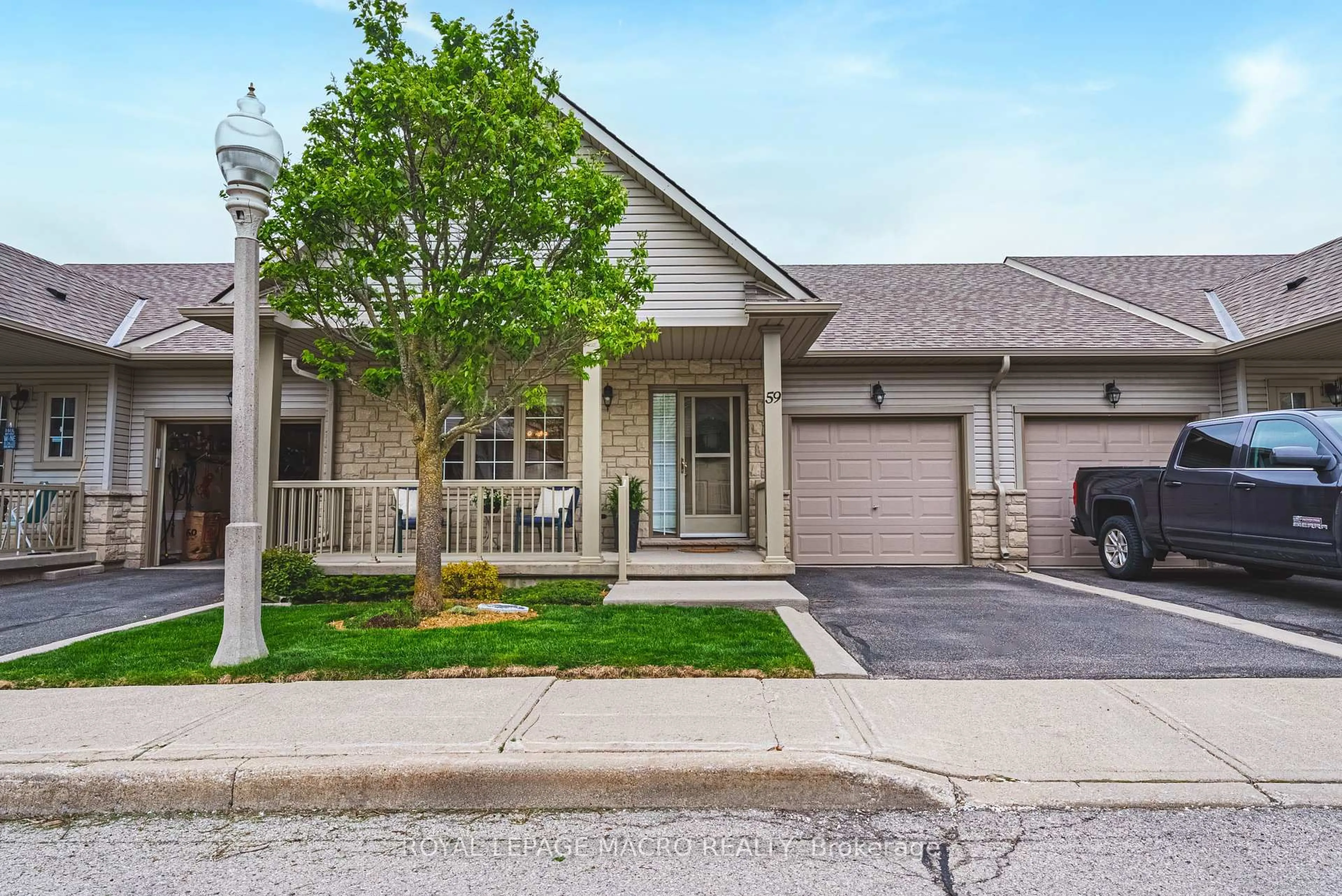 Home with brick exterior material, street for 34 Southbrook Dr #59, Hamilton Ontario L0R 1C0