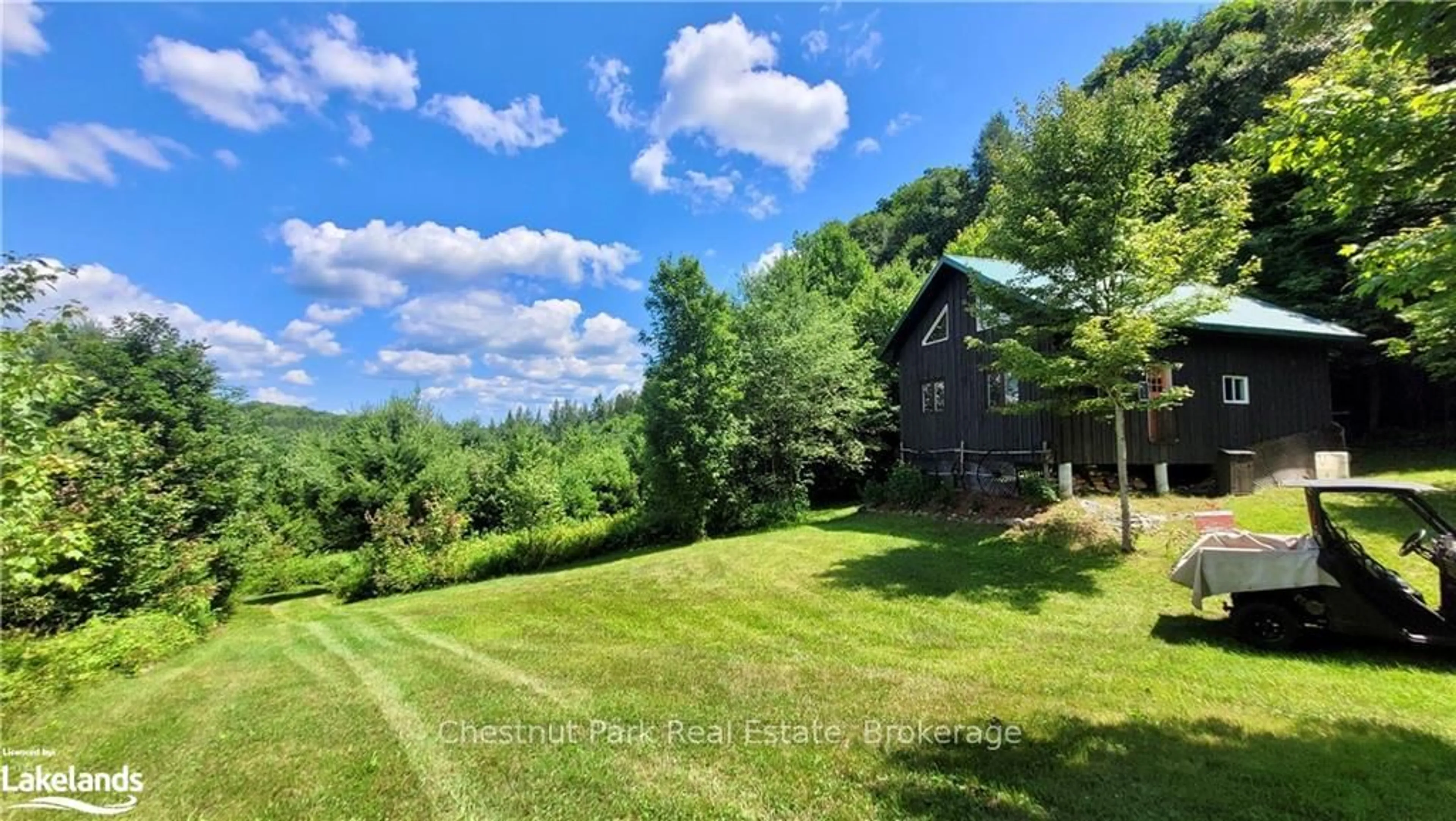 A pic from outside/outdoor area/front of a property/back of a property/a pic from drone, water/lake/river/ocean view for 1060 BAKER Sdrd, Bracebridge Ontario P1L 1W9