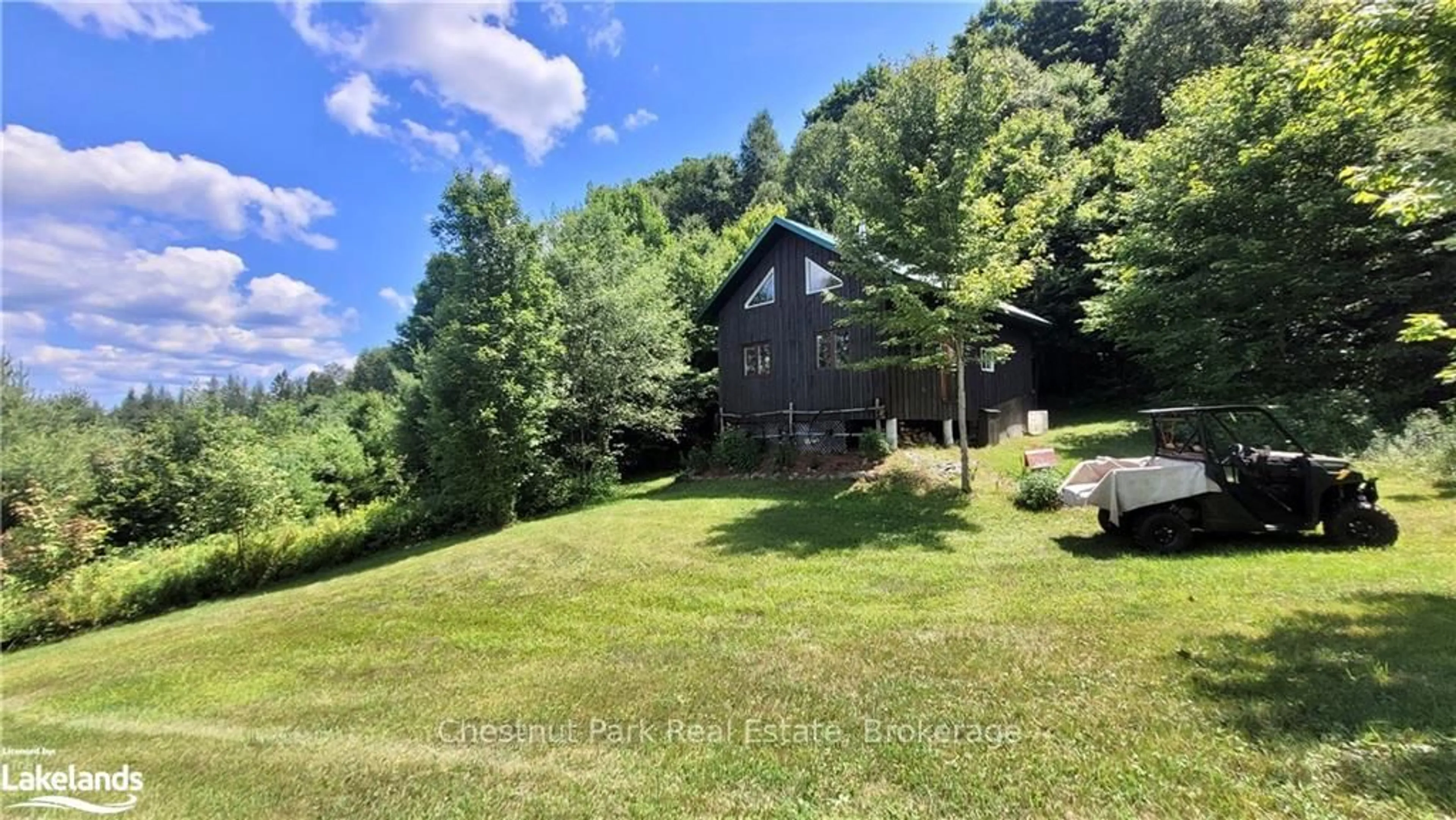 A pic from outside/outdoor area/front of a property/back of a property/a pic from drone, water/lake/river/ocean view for 1060 BAKER Sdrd, Bracebridge Ontario P1L 1W9
